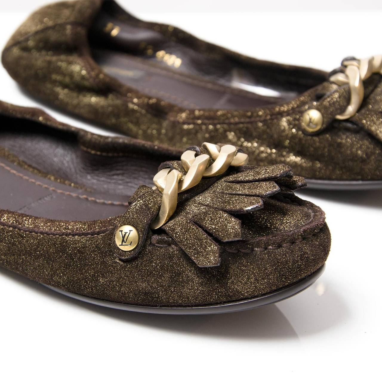 Louis Vuitton Dark brown with a gold sparkle Suede Loafers. 
Come with box and dust bag.