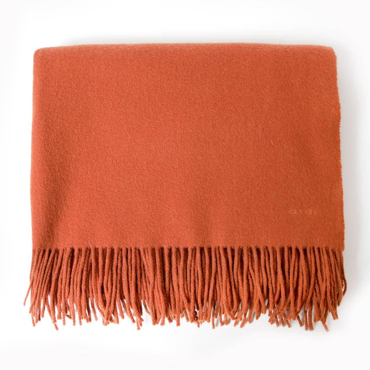 Hermès marge scarf or rectangle plaid in cashmere blend (cashmere 70% / Wool 30%). 
Color: rust