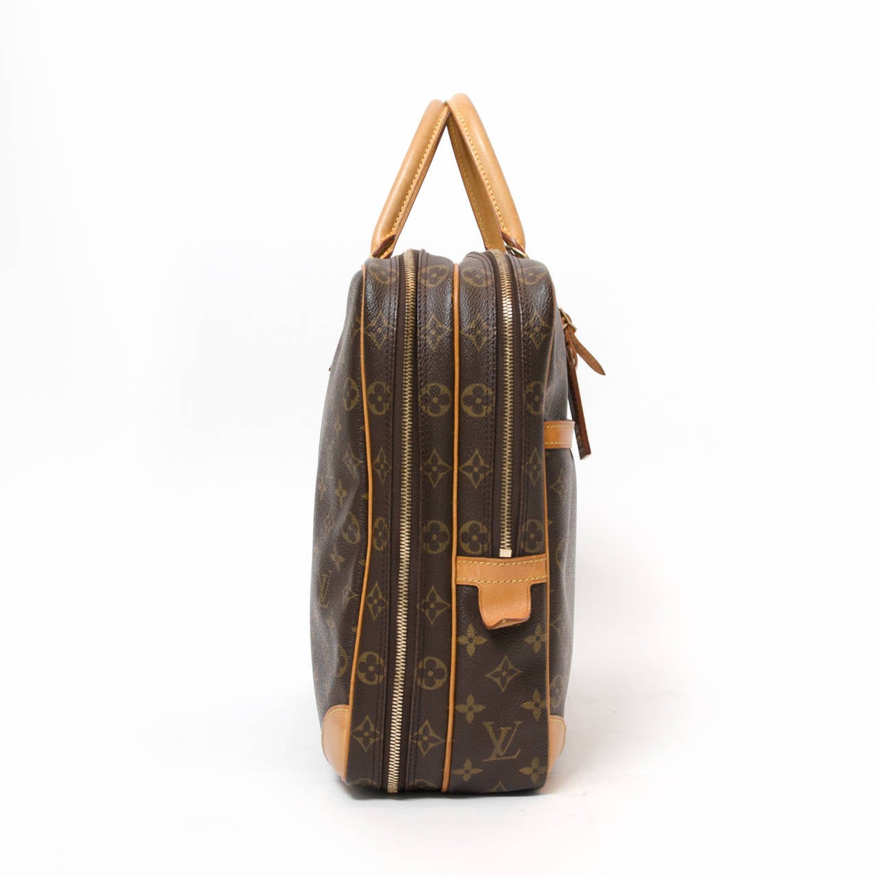 This beautiful and classy Louis Vuitton Monogram Canvas Porte Document Voyage Briefcase is perfect for anyone who wants to carry their precious documents and laptop in style. It features numerous leather lined pockets and slots to organize your