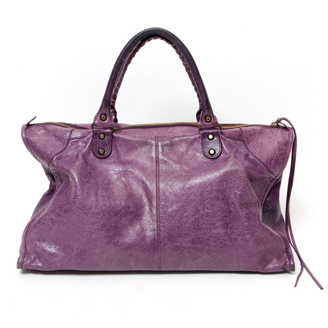 Purple Balenciaga Classic work bag. The iconic moto inspired design elements are all present in this incredible bag.