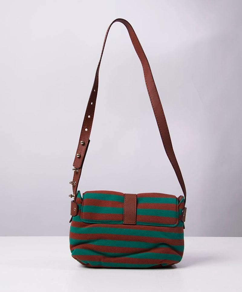 Fabric and leather handbag by Sonia Rykiel in green and brown horizontal stripes and silver hardware.
