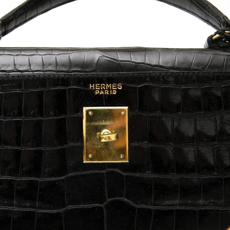 HERMÈS, a black crocodile Kelly 35 bag from the 1960s. - Bukowskis