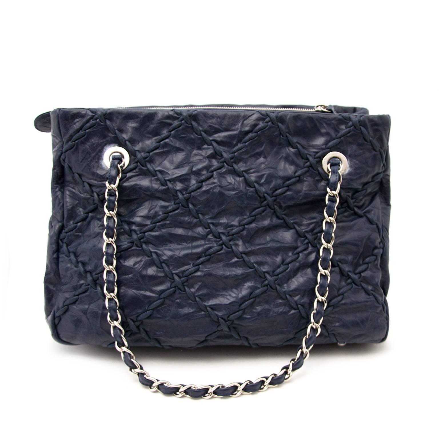 Chanel Blue Grand Shopping Tote Bag
This blue stitched leather Chanel grand shopping tote is the perfect everyday bag. 
The spacious grey lined interior has one zipper and two slip pockets. 
Easily store your essentials in this grand shopping