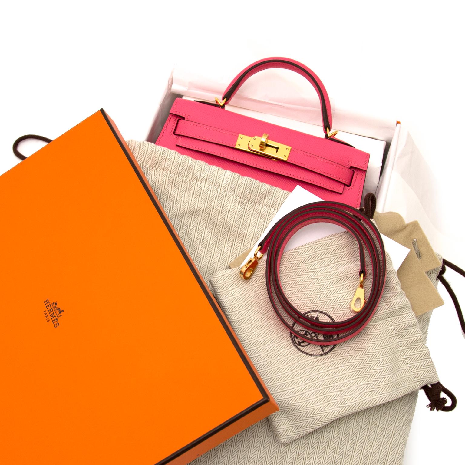 Hermès Kelly II 20cm Mini Veau Epsom Rose Azalee GHW 
Rose azalee, one of the most perfect pink colors Hermès' ever made.

Hermès Kelly mini bags are adorable and almost impossible to get your hands on!

This stunning little piece comes with full