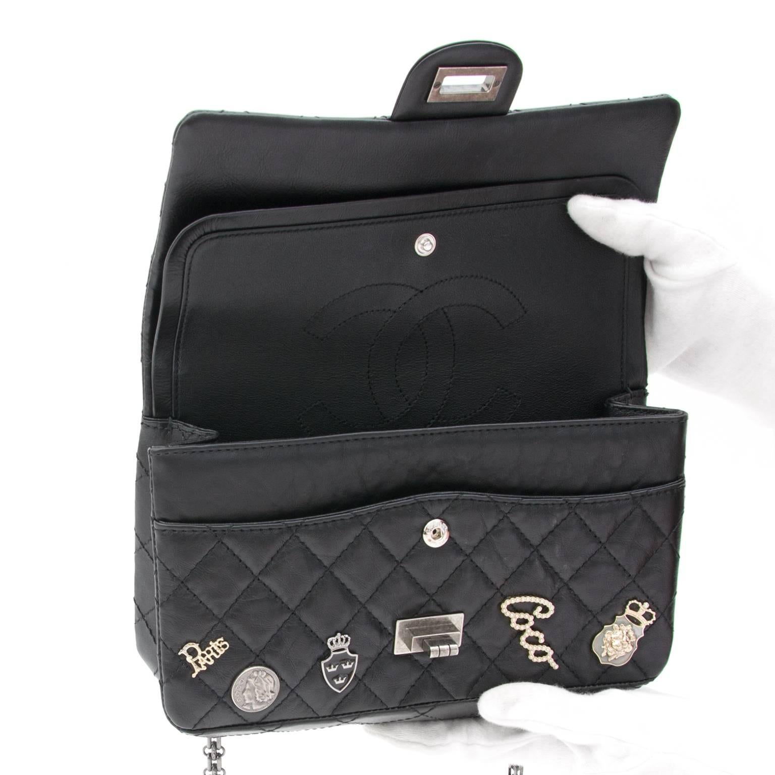 A real collector’s piece this Rare Chanel Lucky Charm 2.55 Reissue double flap bag in size 225.

The bag features 20 cute and meaningful iconic Chanel charms such as a turtle, camelia, number 5, four leaf clover,..
Front flap with Mademoiselle
