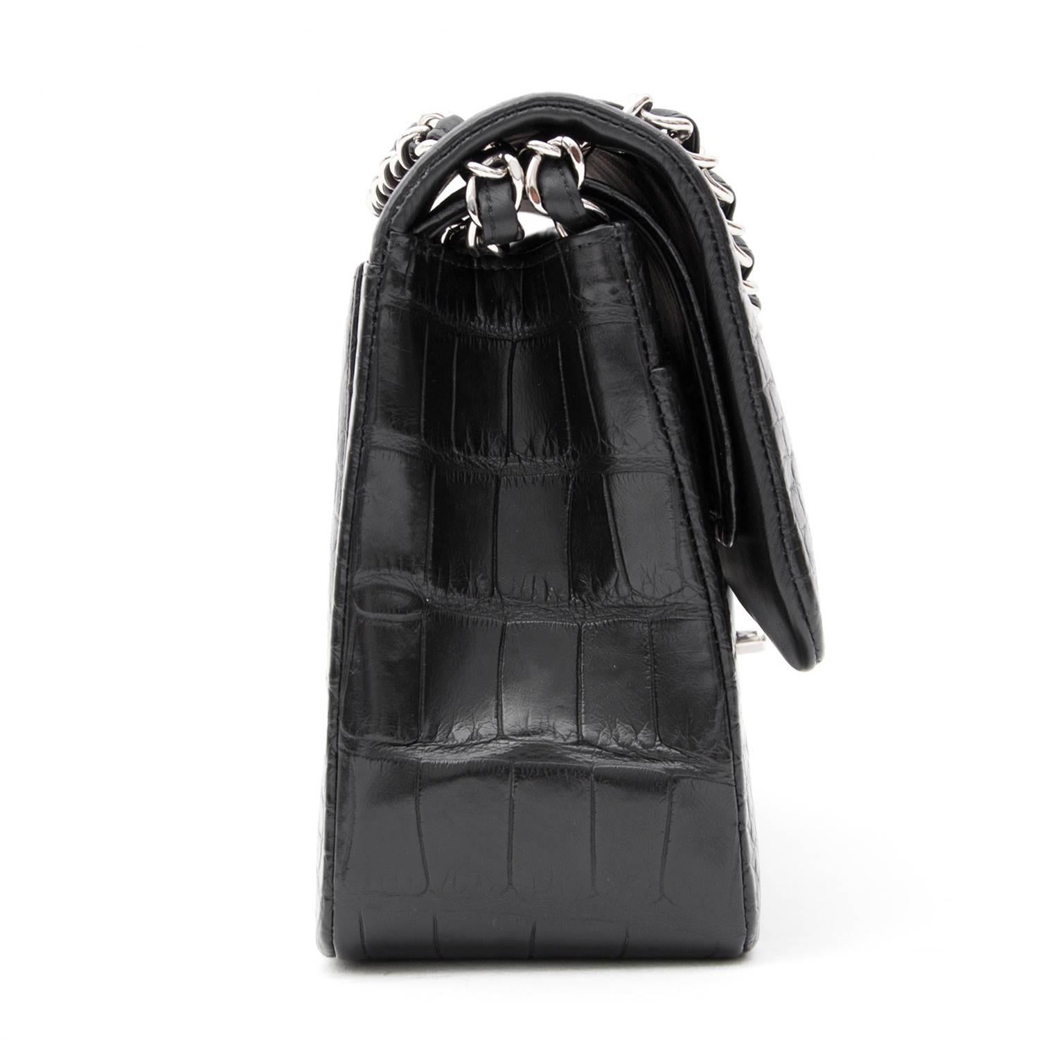 This stunning shoulder flap bag is superbly crafted of matte luxurious exotic 