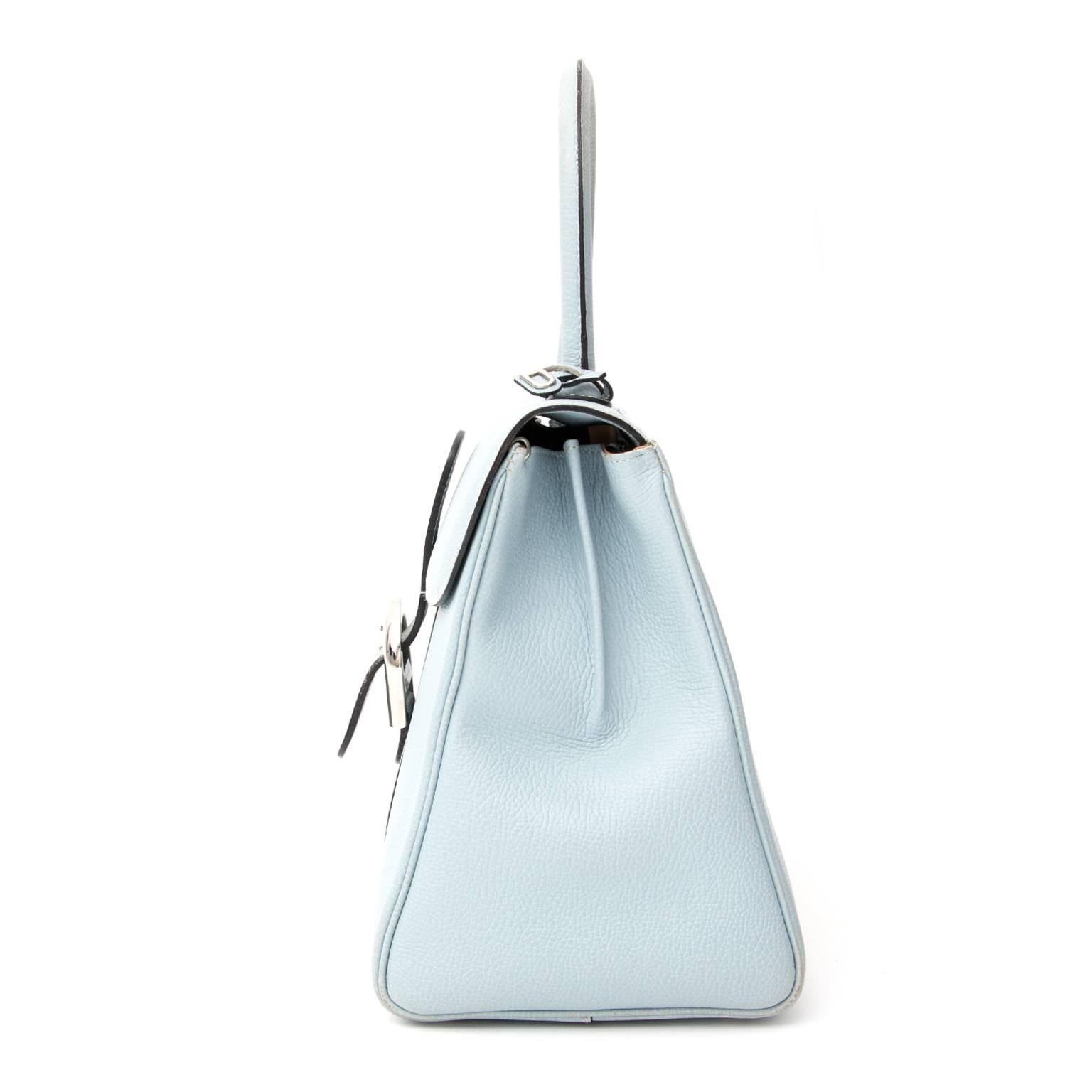Delvaux Baby Blue Brillant in grained leather. 
This beautiful Brillant bag from Delvaux is a timeless piece which you can wear every season.
The interior is in soft nude leather and has two pockets one with a zipper and one without.
Singed with