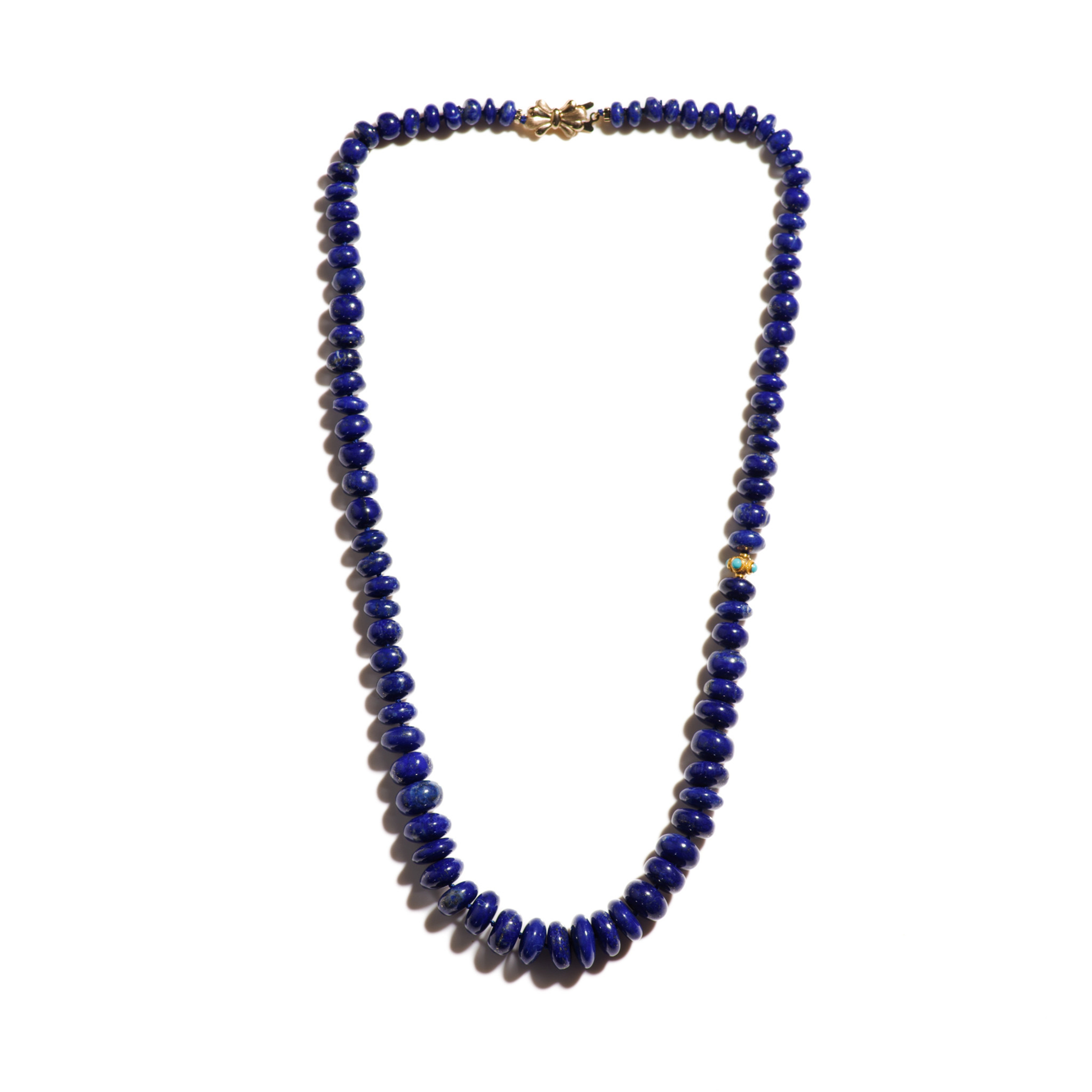 A regal giant royal blue Lapis Lazuli necklace with extremely rare and finest quality Lapis in an exceptional large size and very rare enchanting color. Finished with a sparkling gold sleeping beauty turquoise bead and a cute yellow gold bow clasp.