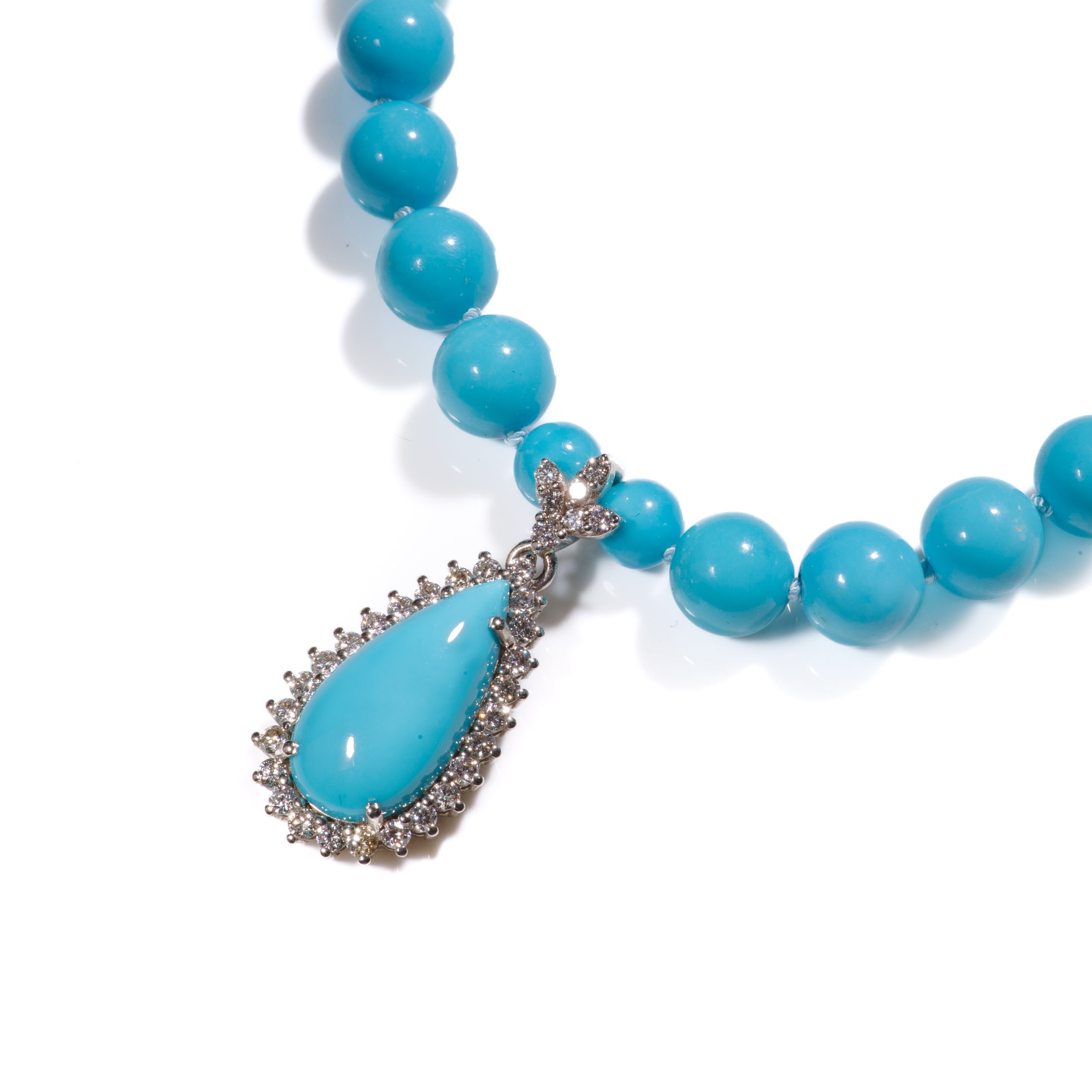 A regal giant 19 inch long handcrafted necklace with extremely rare and pure untreated Sleeping Beauty Turquoises and natural sparkling diamonds. This necklace features fine Robinson Egg Blue turquoises from the sleeping beauty mine in Arizona,