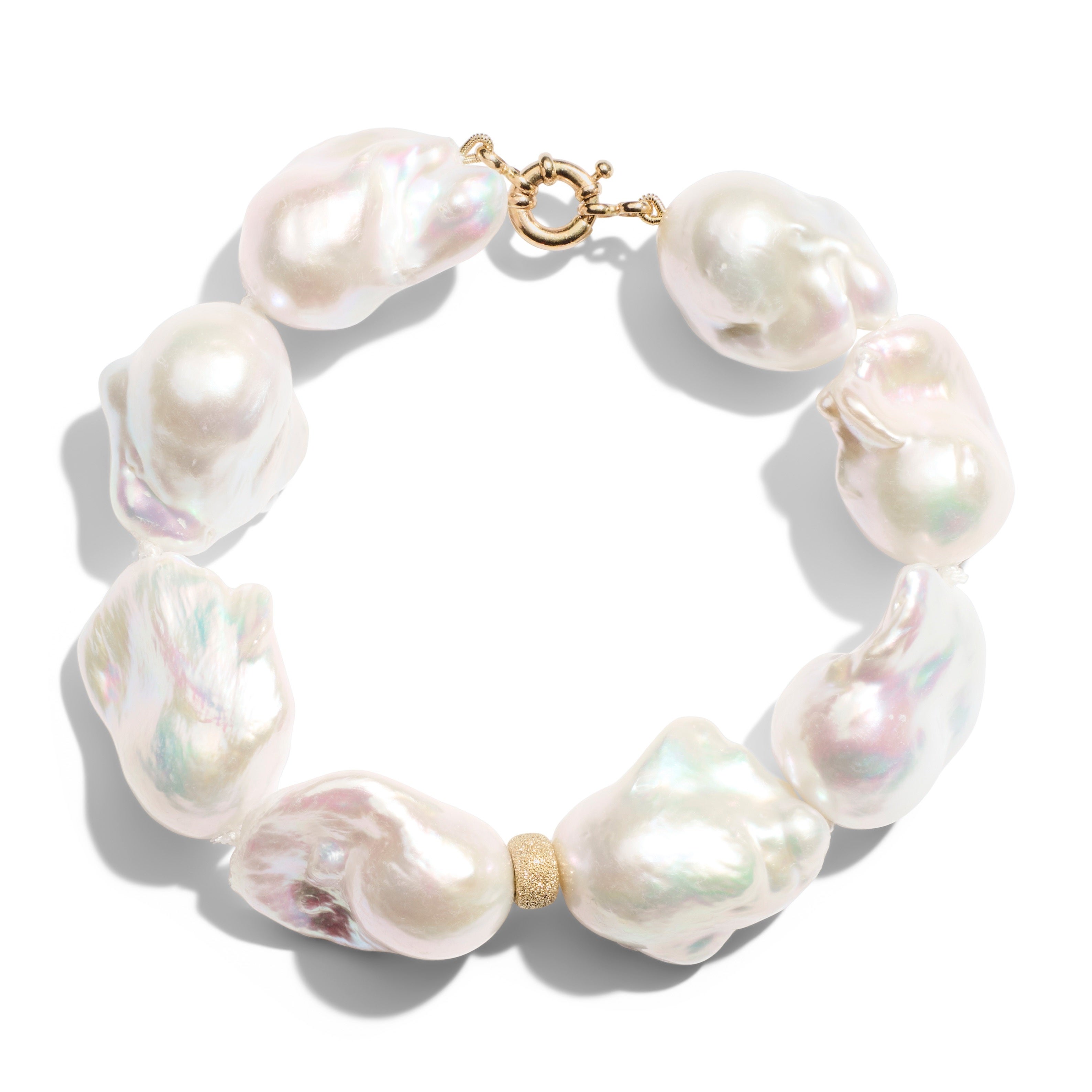 Bracciale gigante barocco in oro giallo con perle a forma di fiamma