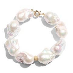 Bracelet géant en or jaune et perles de flammes baroques