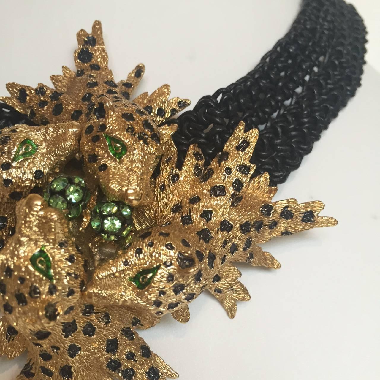 VNG Couture - Green Eyed Gold Metal Parisian Cast Tigers Chasing Emerald Green Swarovski Cut Crystal Beads with an Adjustable Tie Back finished with Vintage Beads -

The advantage of our custom crocheted pieces is the ability to adjust the length