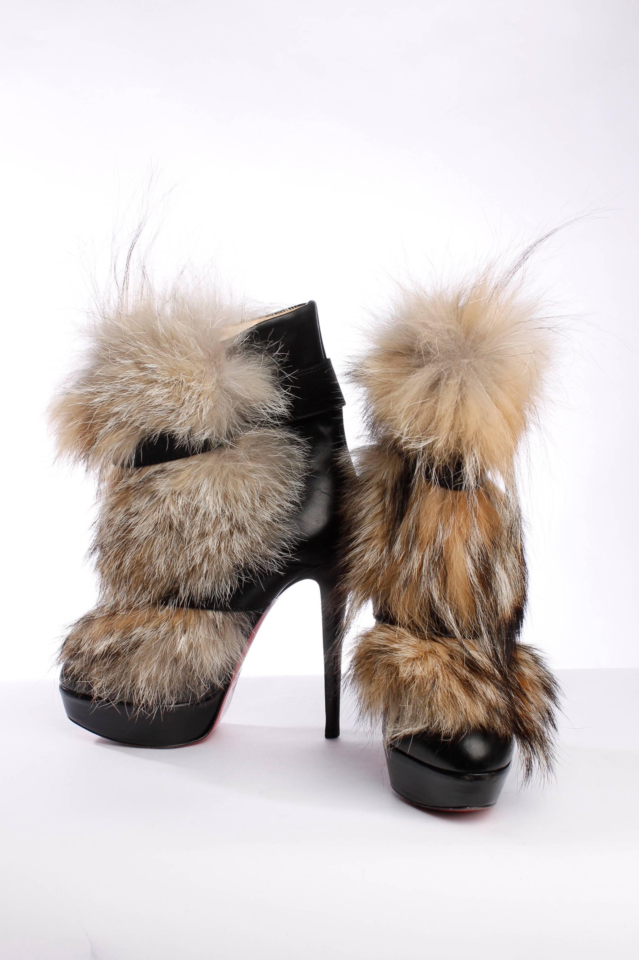 Winter is coming! Time to wear these outstanding Louboutin ankle boots with coyote fur on the front.

A little strap around the ankle and foot keep this boot in its place. The heel is 13 centimeters high and the platform 3 centimeters. On the