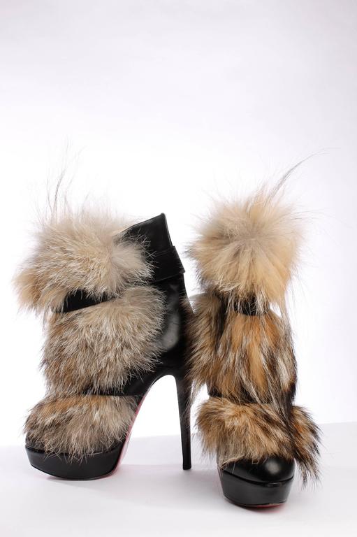 Louboutin Toundra Ankle Boots black leather / coyote fur at 1stDibs