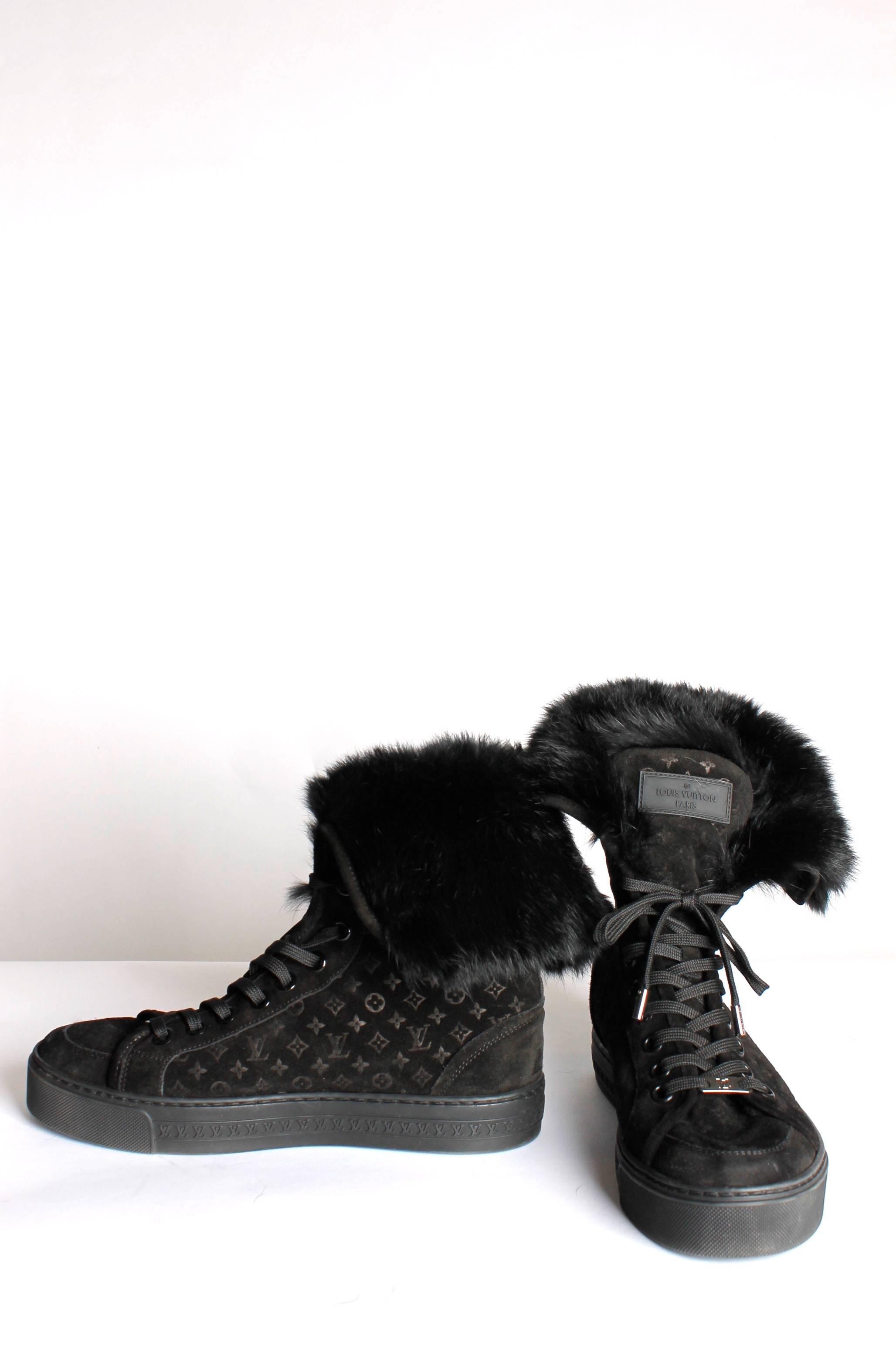 Louis Vuitton made these awesome sneakers; black suede covered with embossed monograms and a large trim of rabbit fur to finish it of.

A thick sole, in the middle a LV-logo trim. The shaft and tongue of the shoe are lined with rabbit fur, the