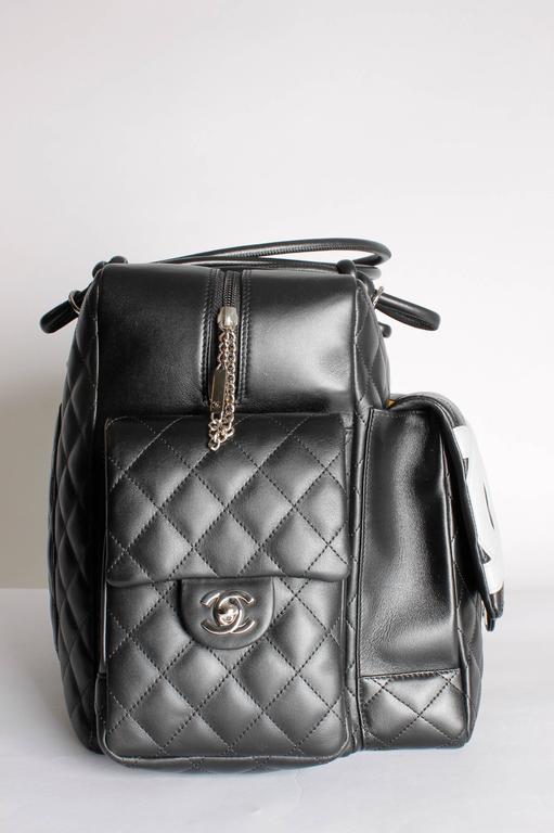 Chanel Quilted Ligne Cambon Multipocket Reporter XL Bag - black/grey  leather at 1stDibs  chanel cambon multi pocket reporter bag, chanel cambon  reporter bag, cambon multi pocket bag