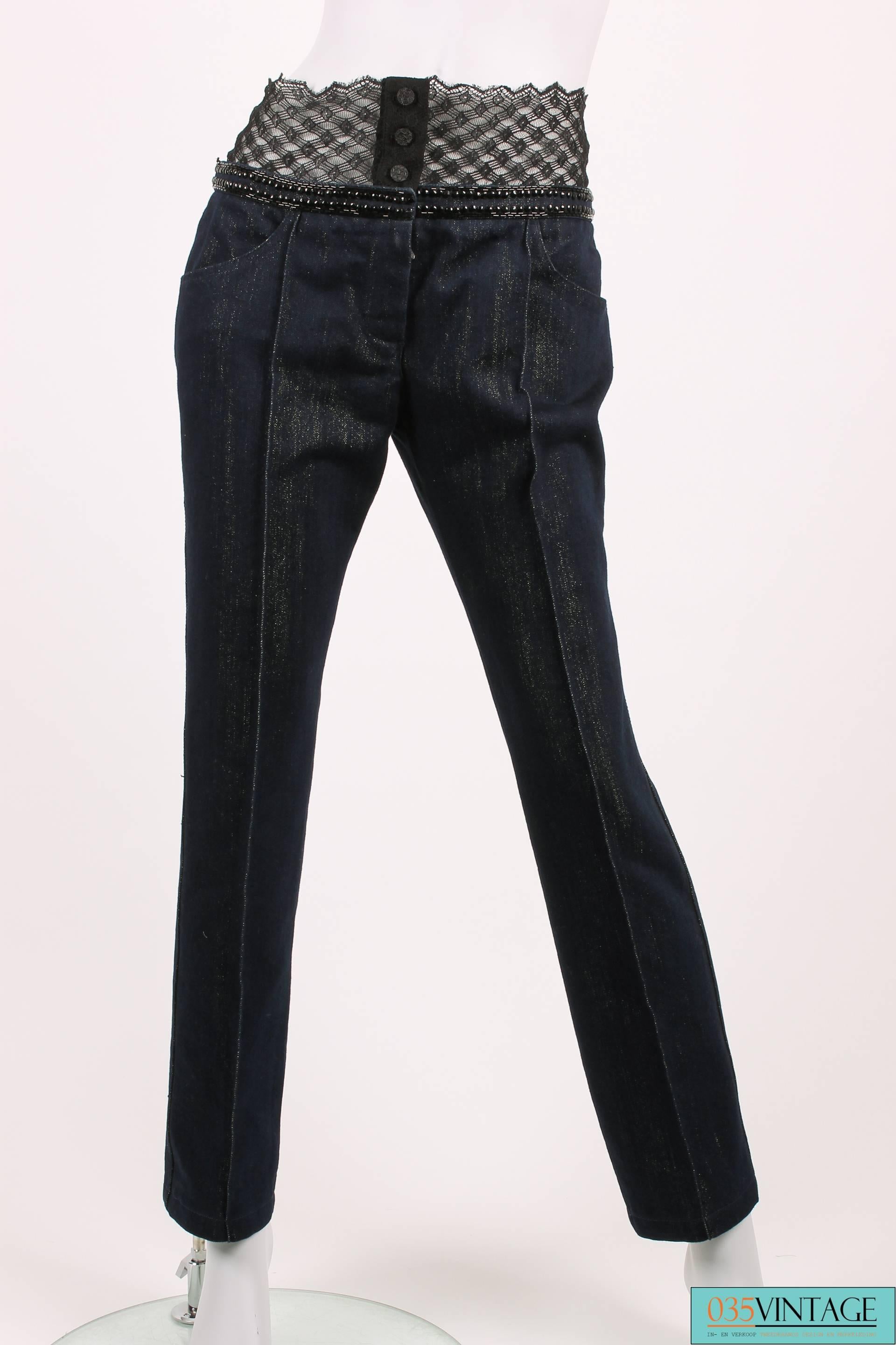Chanel jeans with a twist from the Runway Collection of 2004!

This pair of jeans is sophisticated and should rather be called 'a pair of denim pants'. It is straight cut and has a seam in the middle of the leg. The dark blue jeans fabric has a