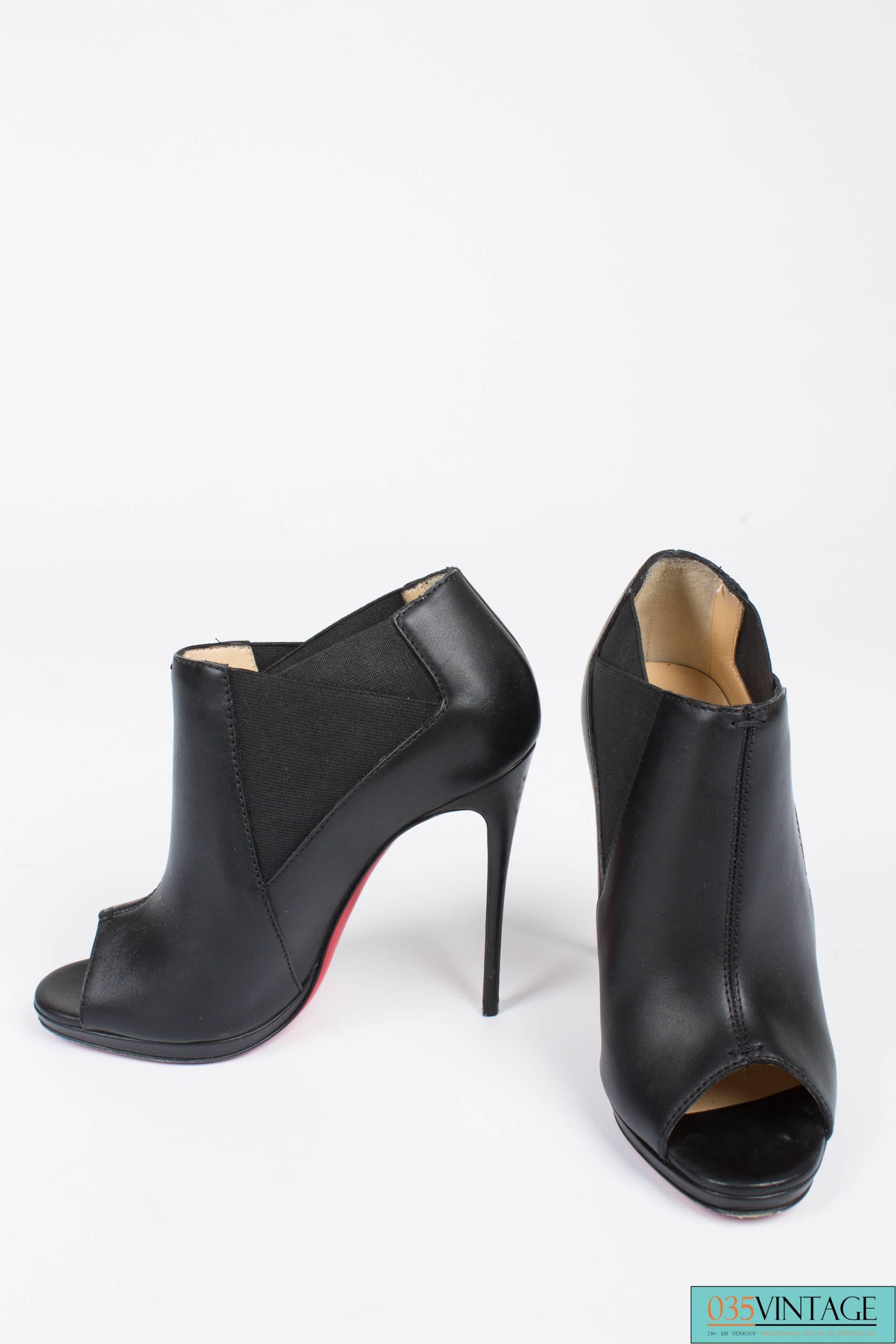 Black Louboutin High Heeled Peep Toe Boots - black leather 