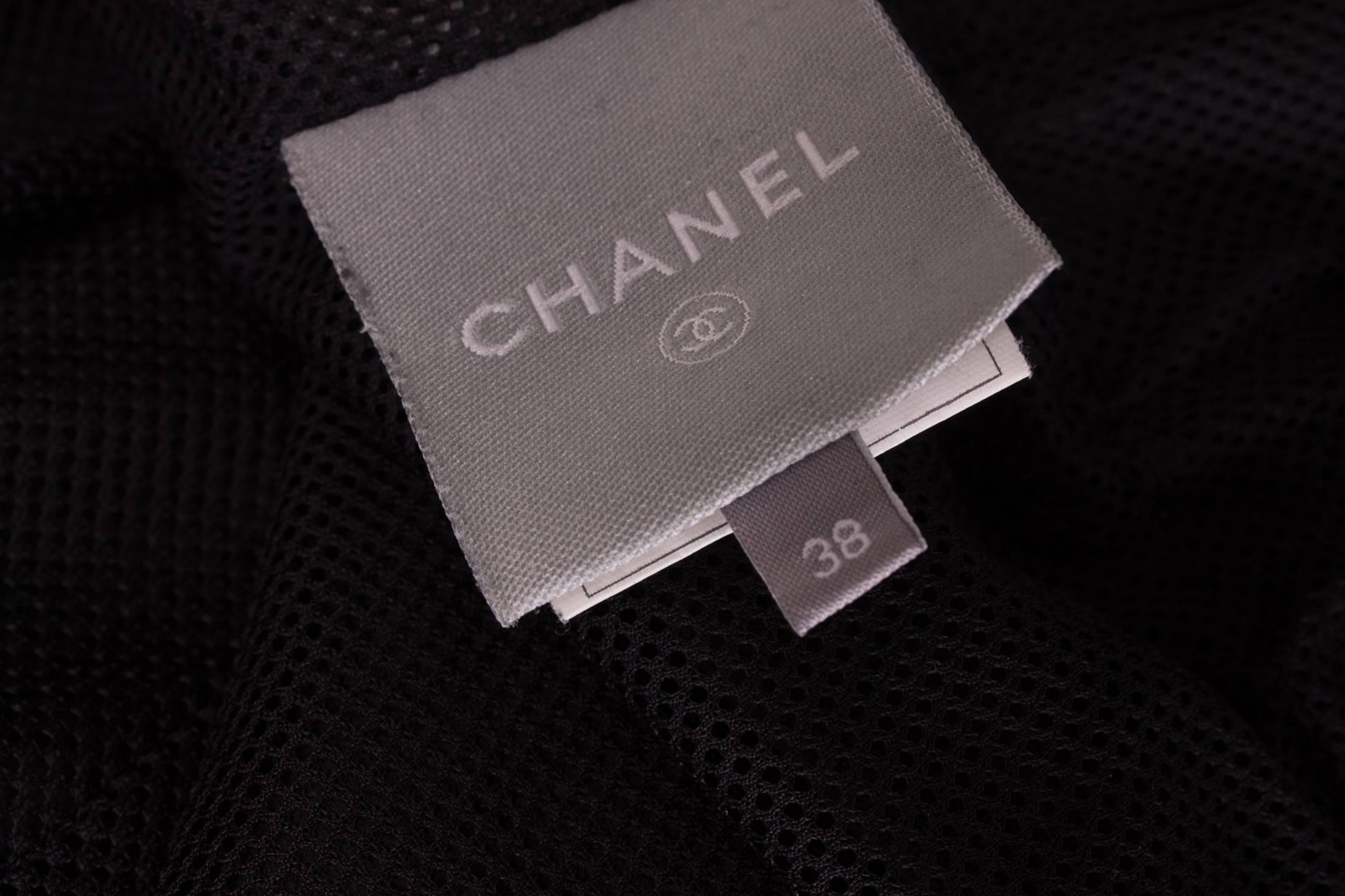 

   

Super sturdy leather jacket by Chanel, this one is gorgeous!

Has long sleeves and more than hip length, lining in black fishnet fabric.  As much as six flappockets with a pushbutton at the front and two zip pockets. Zippers with a black