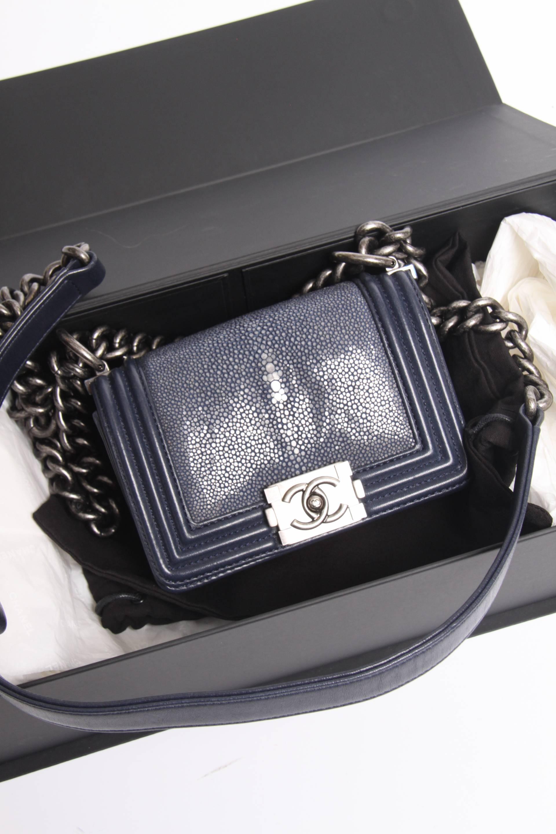 Nice!!! The iconic CHANEL Boy Bag with a modern look, this one is a mini! And a limited edition, the flap is made of stingray!

This blue bag is from 2016, in 2011 Karl Lagerfeld introduced the signature lock of this bag. An unique lock, you have to