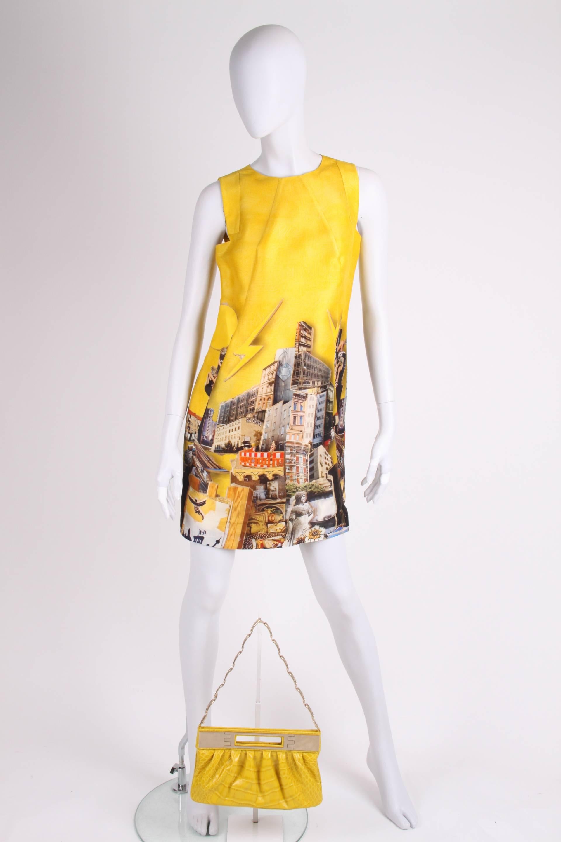This Versace dress from the fall/winter collection of 2008 was designed by a very special couple: Donatella Versace and the Dutch artist Tim Roeloffs. Highly collectable!

The beautiful and colourful print is based on images of Berlin, the main