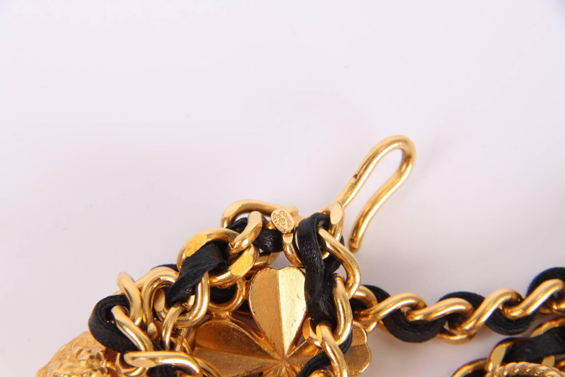 Vintage Chanel chain which can be worn as a belt, but also as a necklace.

This gold-tone chain measures 95 centimeters and holds as much as 21 charms which represent the iconic fashion brand: a four-leaf clover, Leo the Lion, lucky star, 5, Coco