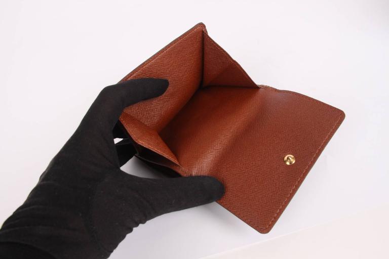 Louis Vuitton Elise Double Flap Monogram Wallet - dark brown at 1stDibs  louis  vuitton monogram wallet black, louis vuitton elise wallet, louis vuitton  pink and brown wallet