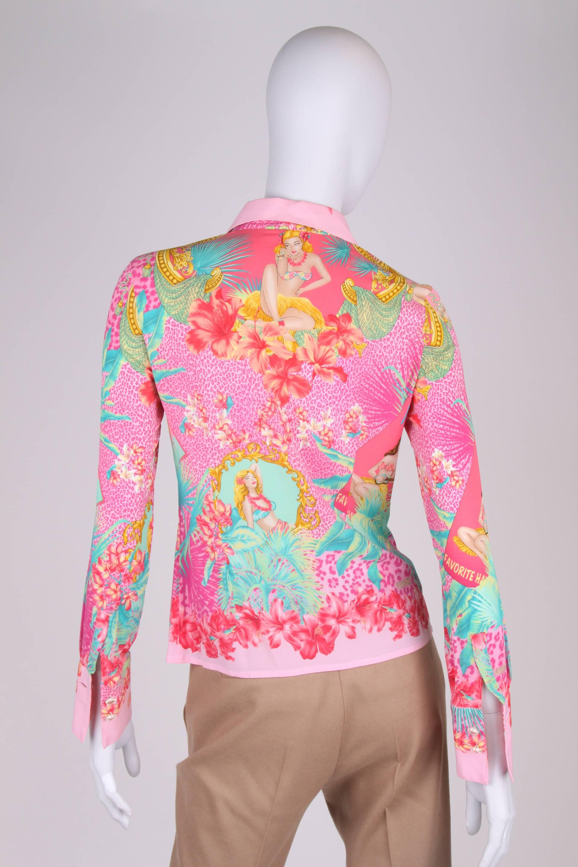 olourful blouse by Versace embellished with a Hawai print.

This cheerful print is executed in different shades of pink, green and yellow. A normal size collar, long sleeves with cuffs and gold-tone buttons with a Medusa head.

Some spandex is added