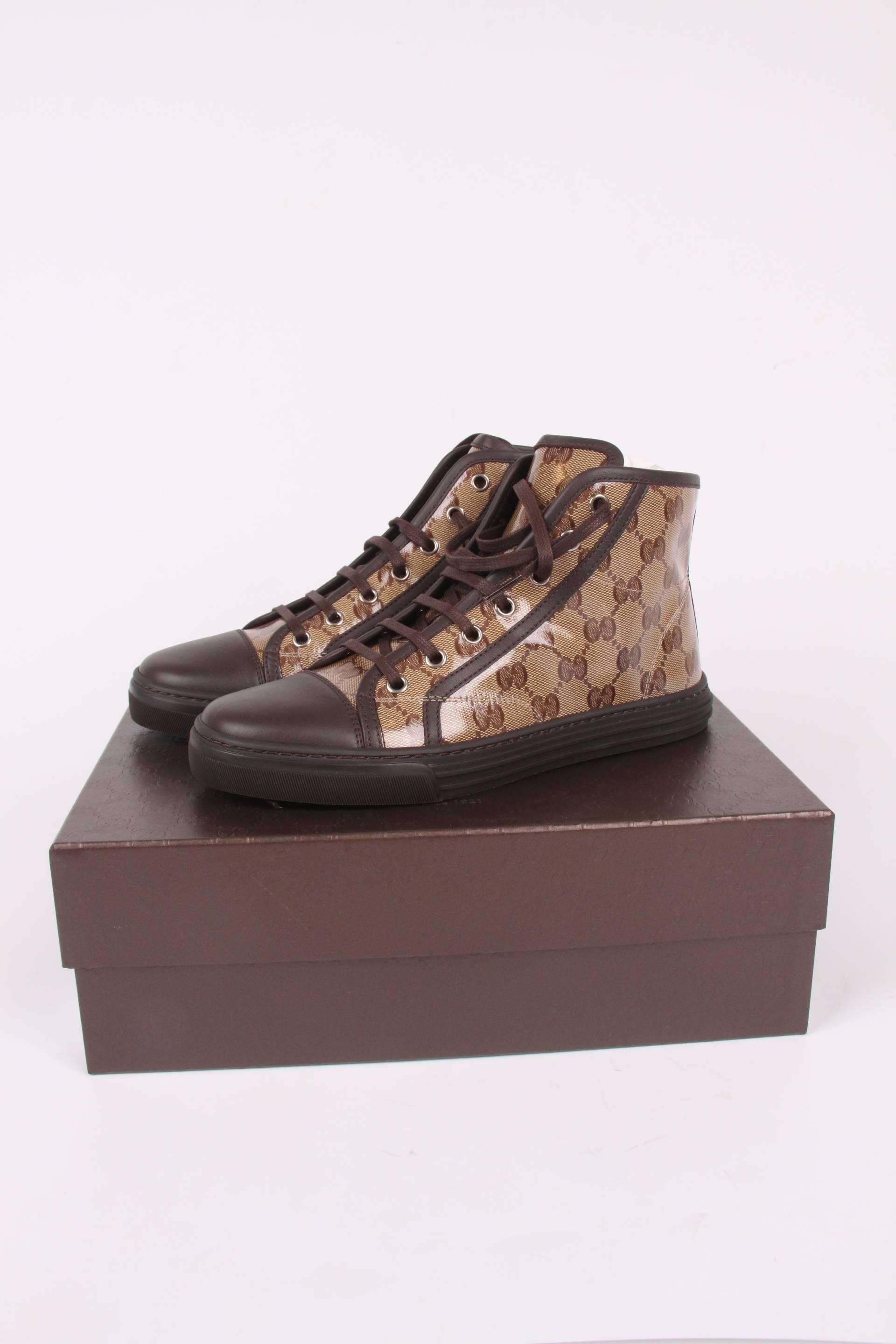 Sporty sneakers by Gucci; sturdy and yet elegant.

The coated canvas is decorated with the Guccissima pattern, detaling in dark brown leather. The laces and rubber outsole are also  excecuted in black. Fully lined with dark brown leather.