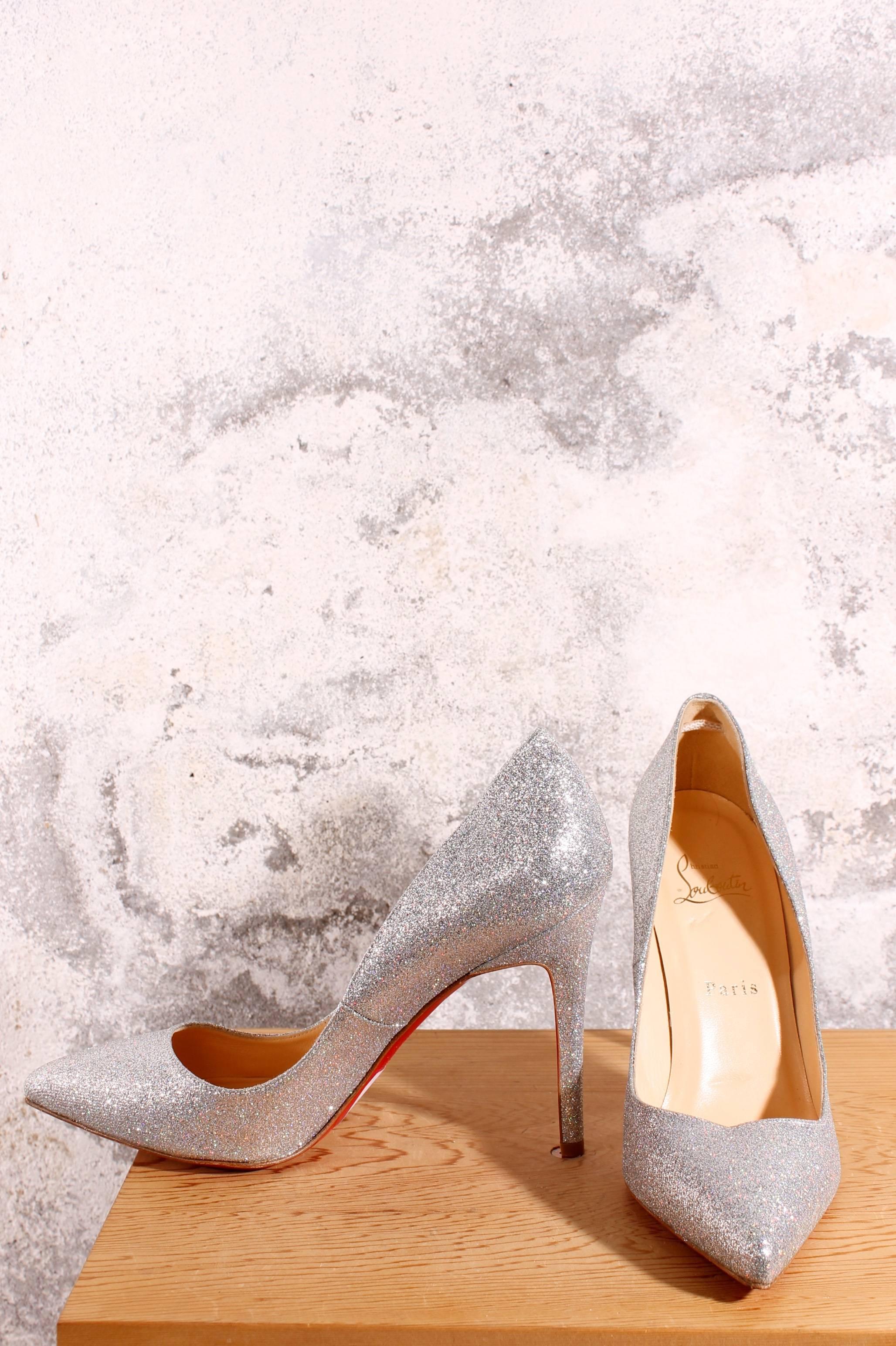 Shiny silver pumps by Christian Louboutin. This pair is new, has never been walked on before. Lining in nude-coloured leather. 
Heels are 10,5 centimeter high, pointed tip and fully covered with silver glitter. A little piece of elastic on the