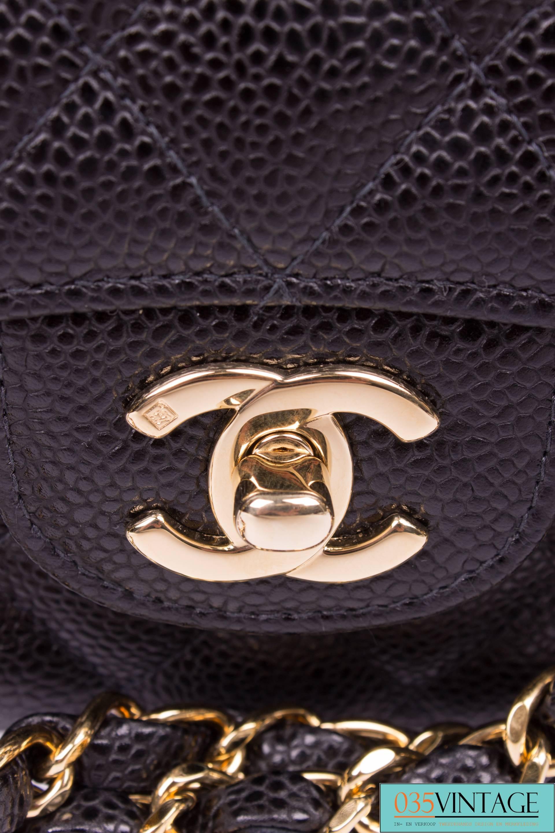 chanel 2.55 caviar medium flap bag