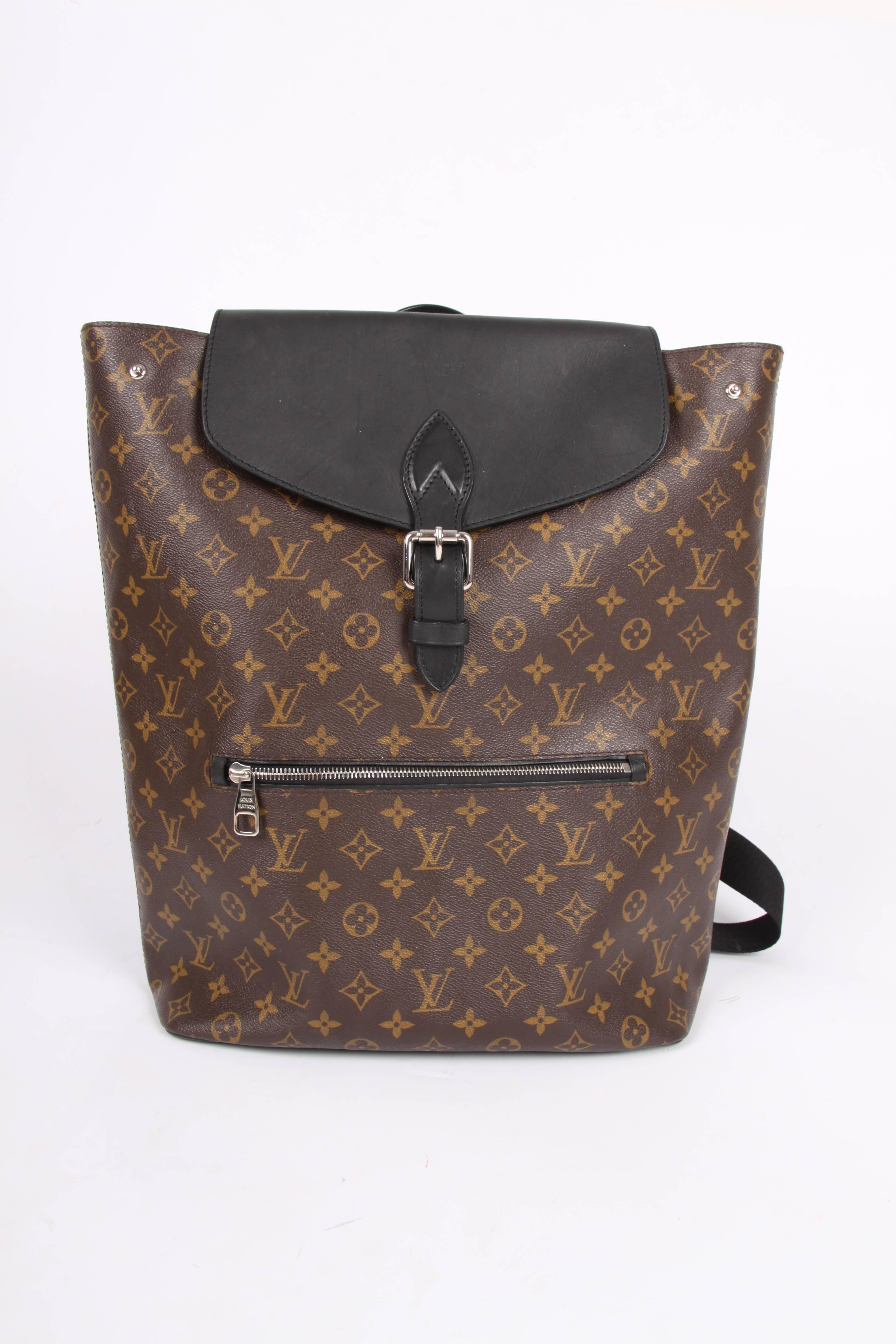 Large sized backpack with a modern shape; the Louis Vuitton Palk Backpack!

Of course crafted of dark brown canvas covered with LV monograms, the flap is made of black leather and decorated with silver-tone hardware. Black leather piping and softly