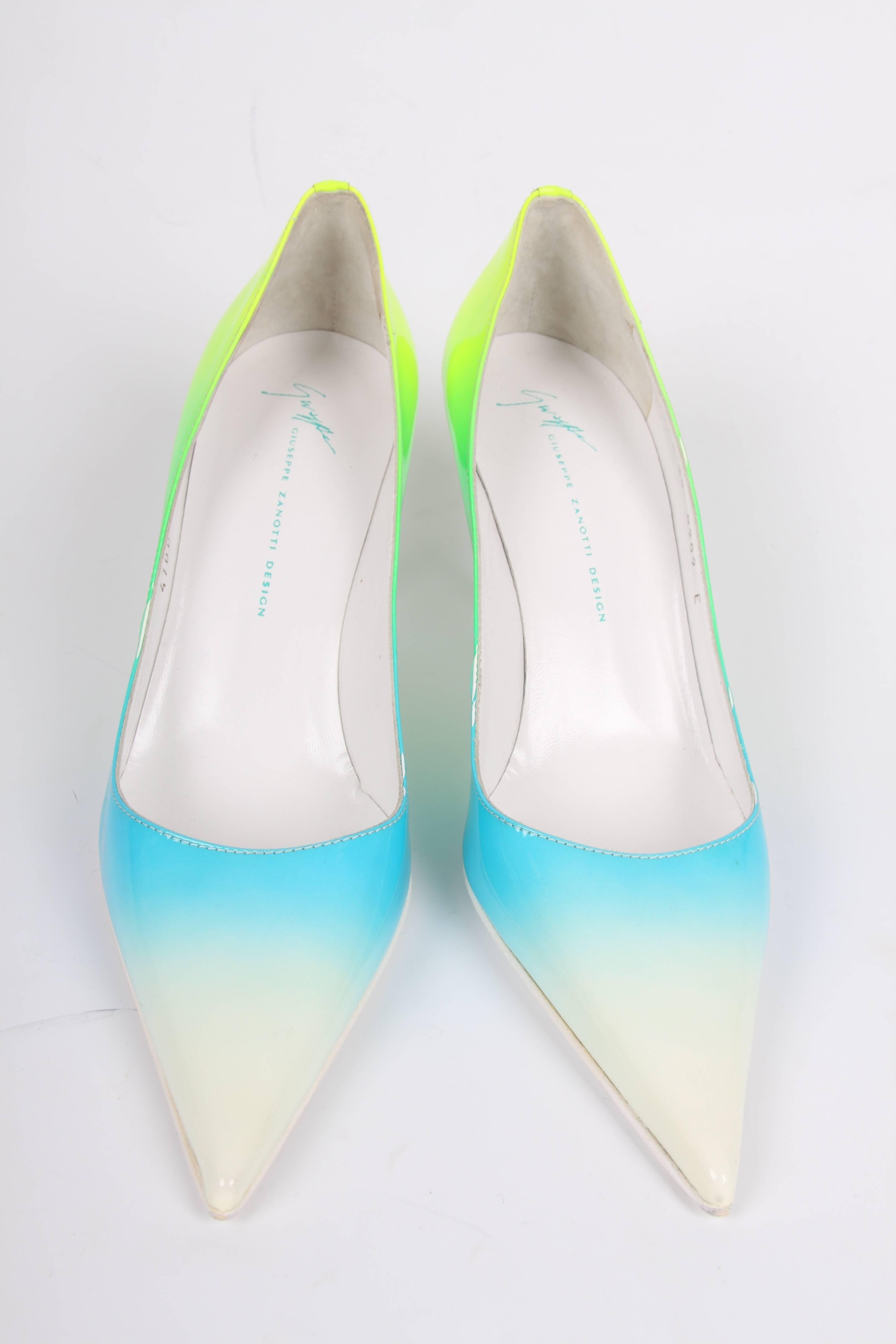 White, blue, green and yellow patent leather high-heeled pumps by Giuseppe Zanotti with a pointy toe.    

The heel measures 8 centimeters, no platform. A leather outsole, no signs of usage. New! 

In very good condition, 10/10

Size: 39

Made in