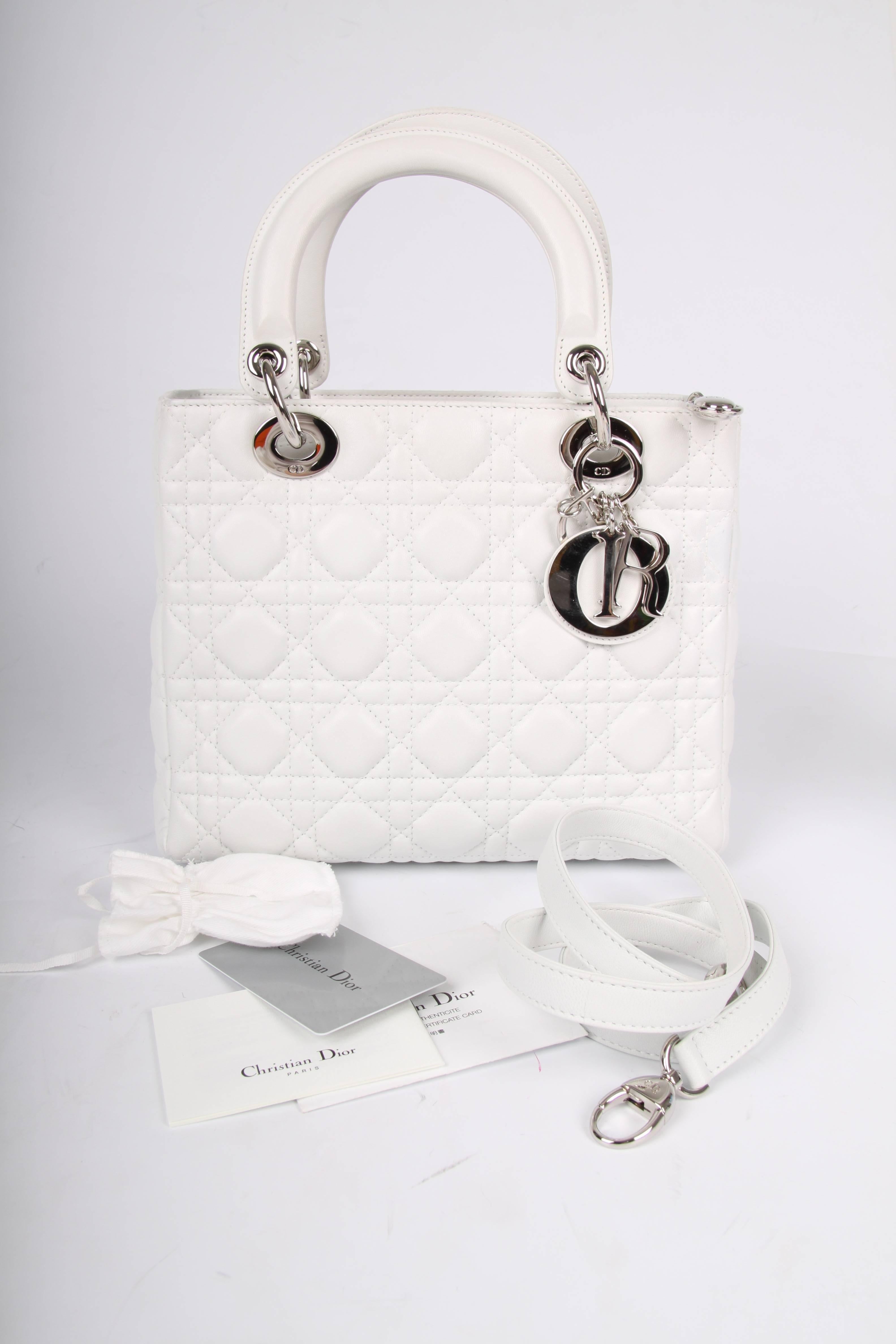 Oooh la laaaa! A marvellous bag by Dior... The My Lady Dior Bag!

This cutie comes with dustdag, clochette for the charms, care booklet and authenticity card. You name it!

Made of smooth white lambskin leather, quilted in the famous diamond