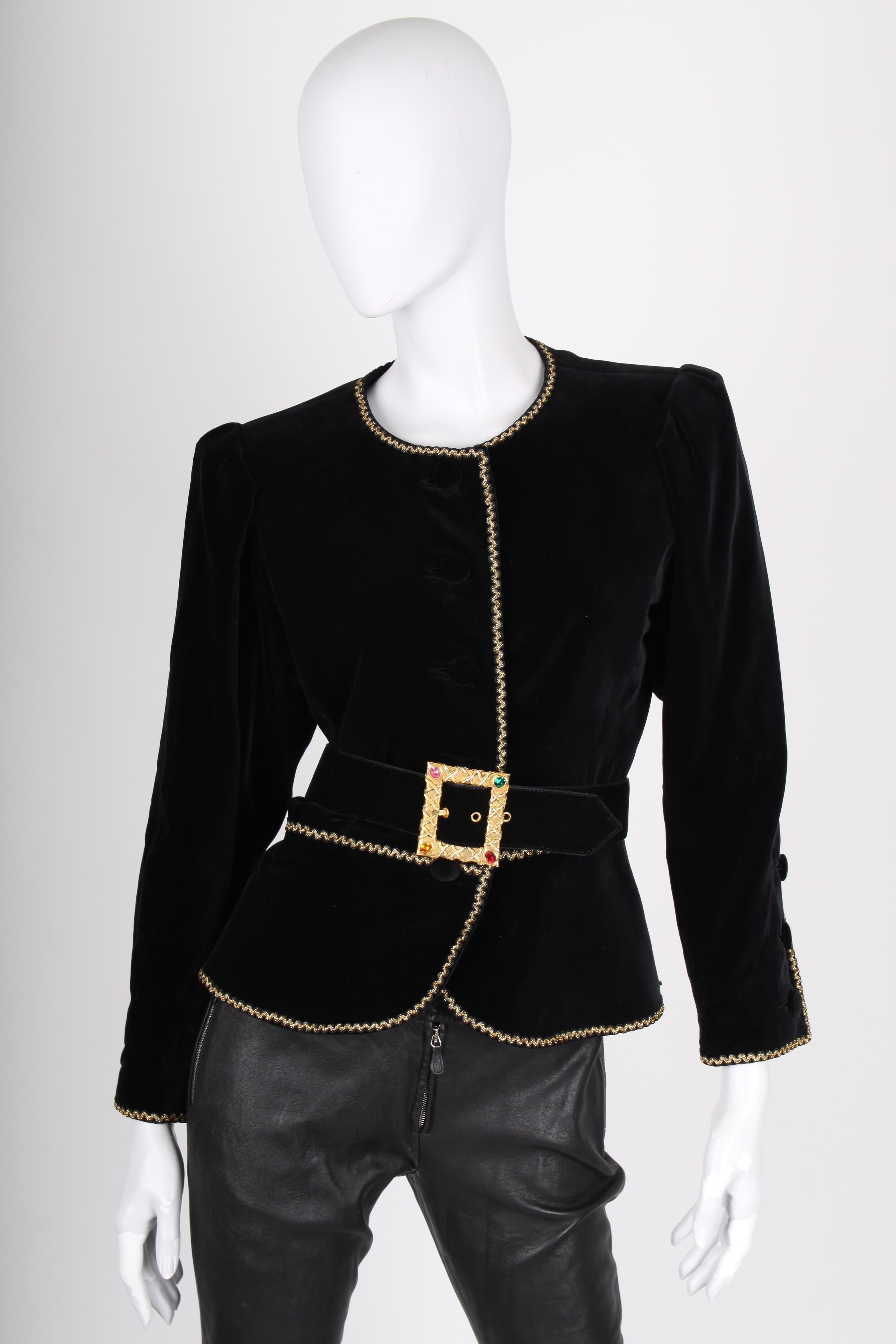 Black velvet jacket by Yves Saint Laurent Rive Gauche. Vintage!

A round neckline and light padding in the shoulders, rather large puff sleeves with three buttons at the end. Front closure with five buttons. No pockets. Fully lined with black shiny