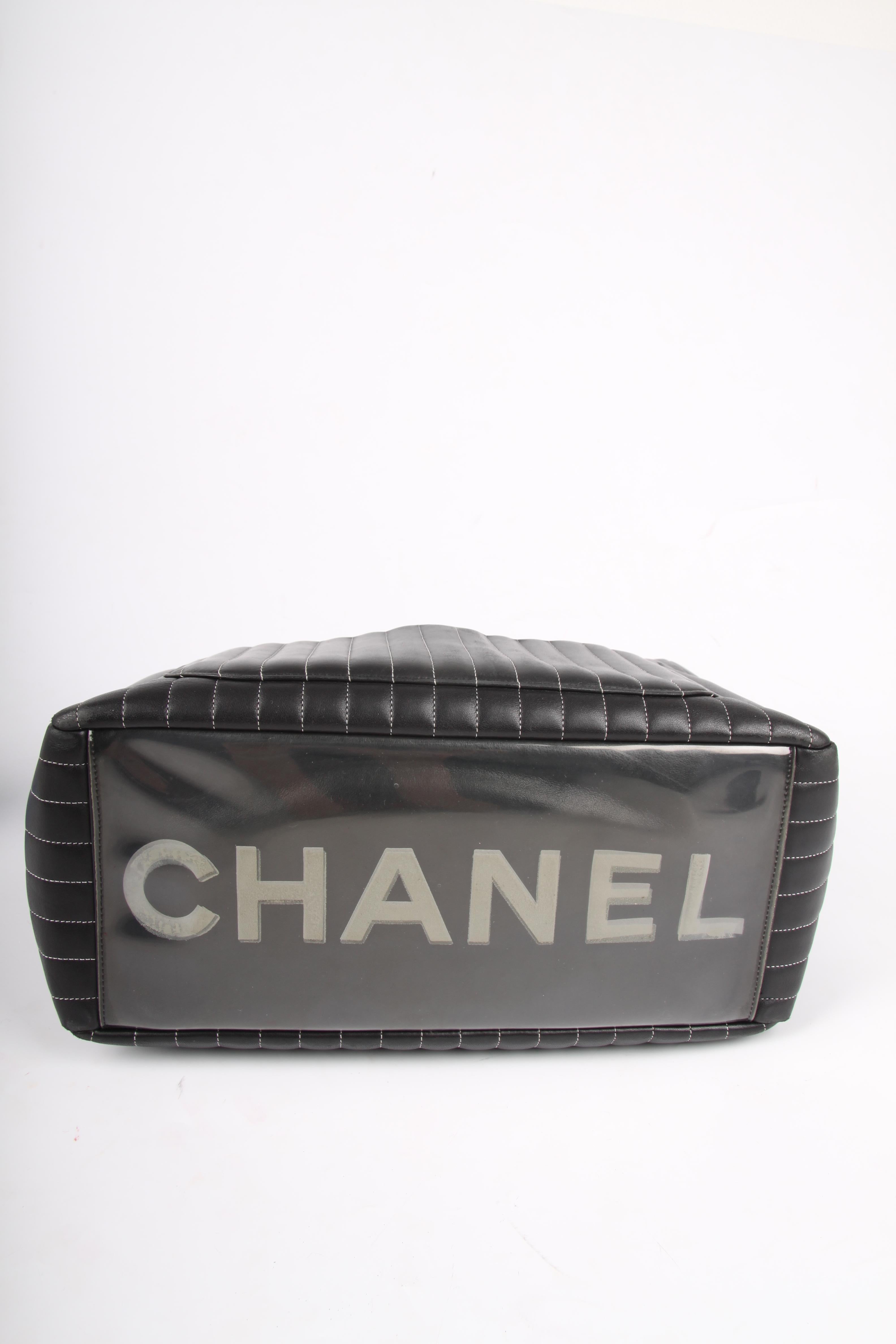This one is very special! It is the Mademoiselle Vertically Quilted Shopper by Chanel. Nice!!

Crafted from black lambskin leather embellished with white vertical stitching, silver-tone hardware and a patch pocket on the exterior. The bottom is made
