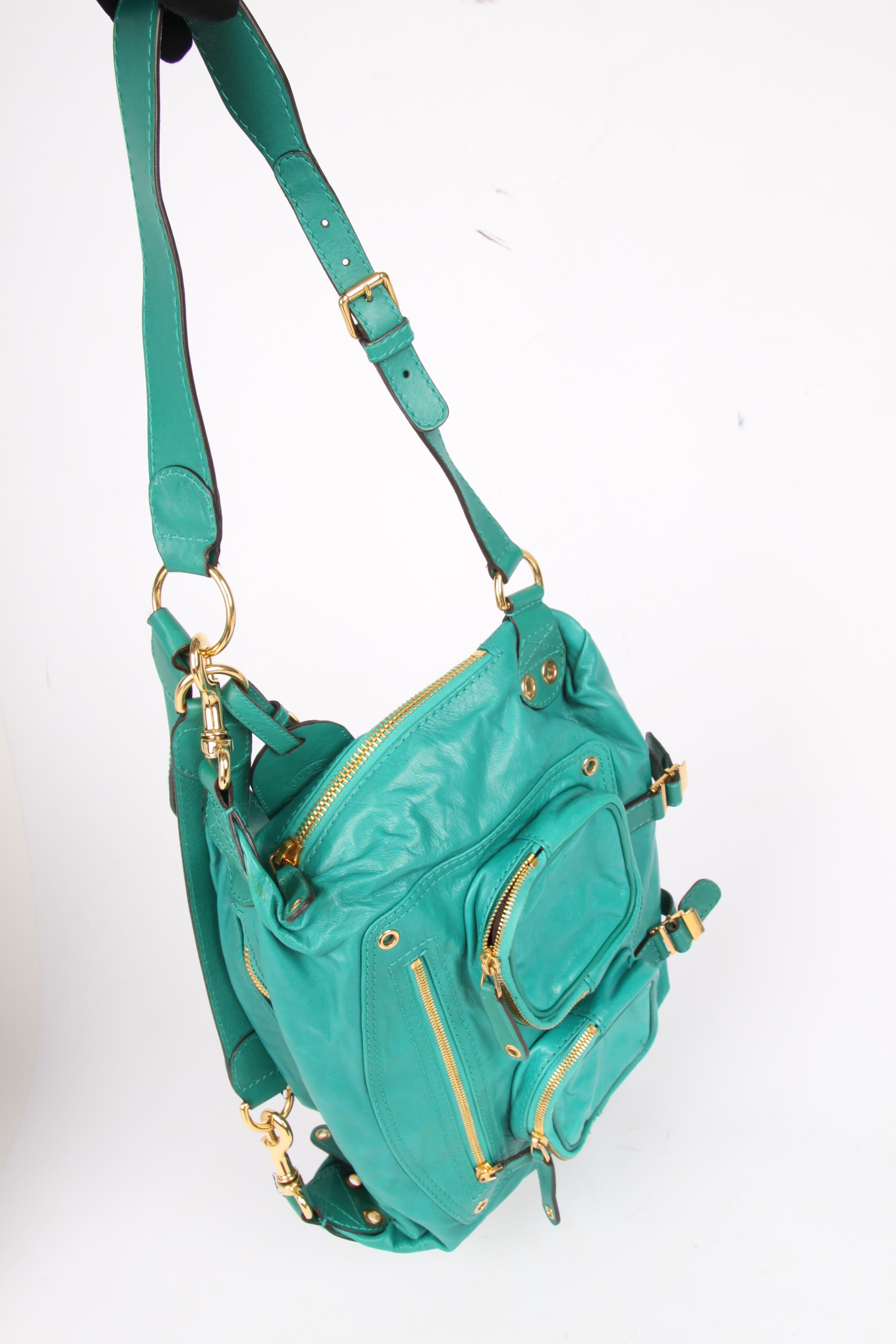 This Gucci Darwin Convertible Medium backpack is excellent on a trip or just running errands; hands-free convenience!

Crafted from green leather with gold-tone hardware. Three zipped pockets at the front and one on each side of the bag. Lining in