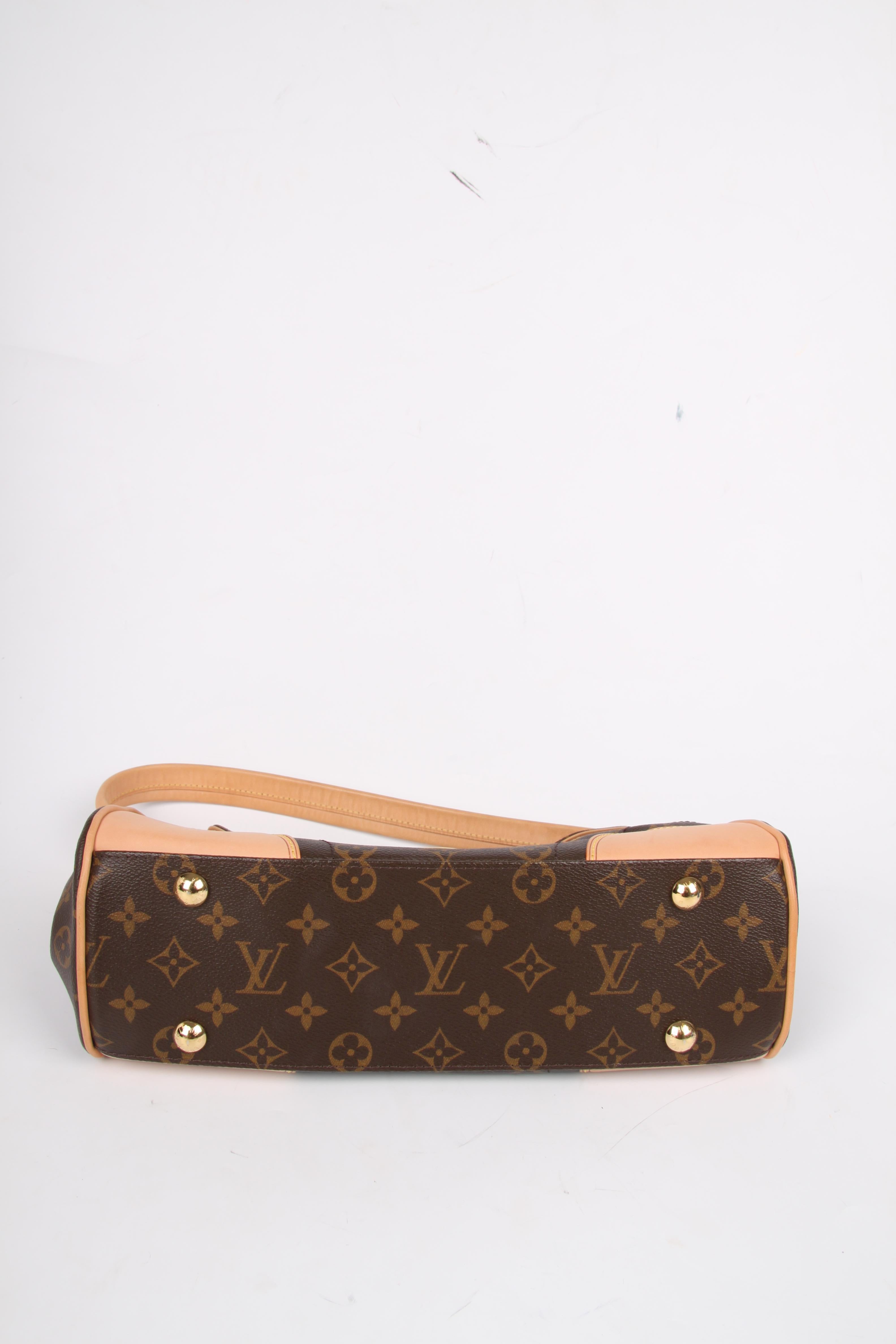 This wonderful bag is named after the posh area of Los Angeles; it is the Louis Vuitton Beverly MM Monogram Bag.

Of course crafted from the welknown dark brown canvas is covered with LV monograms. Garnished with natural-tone leather and gold-tone