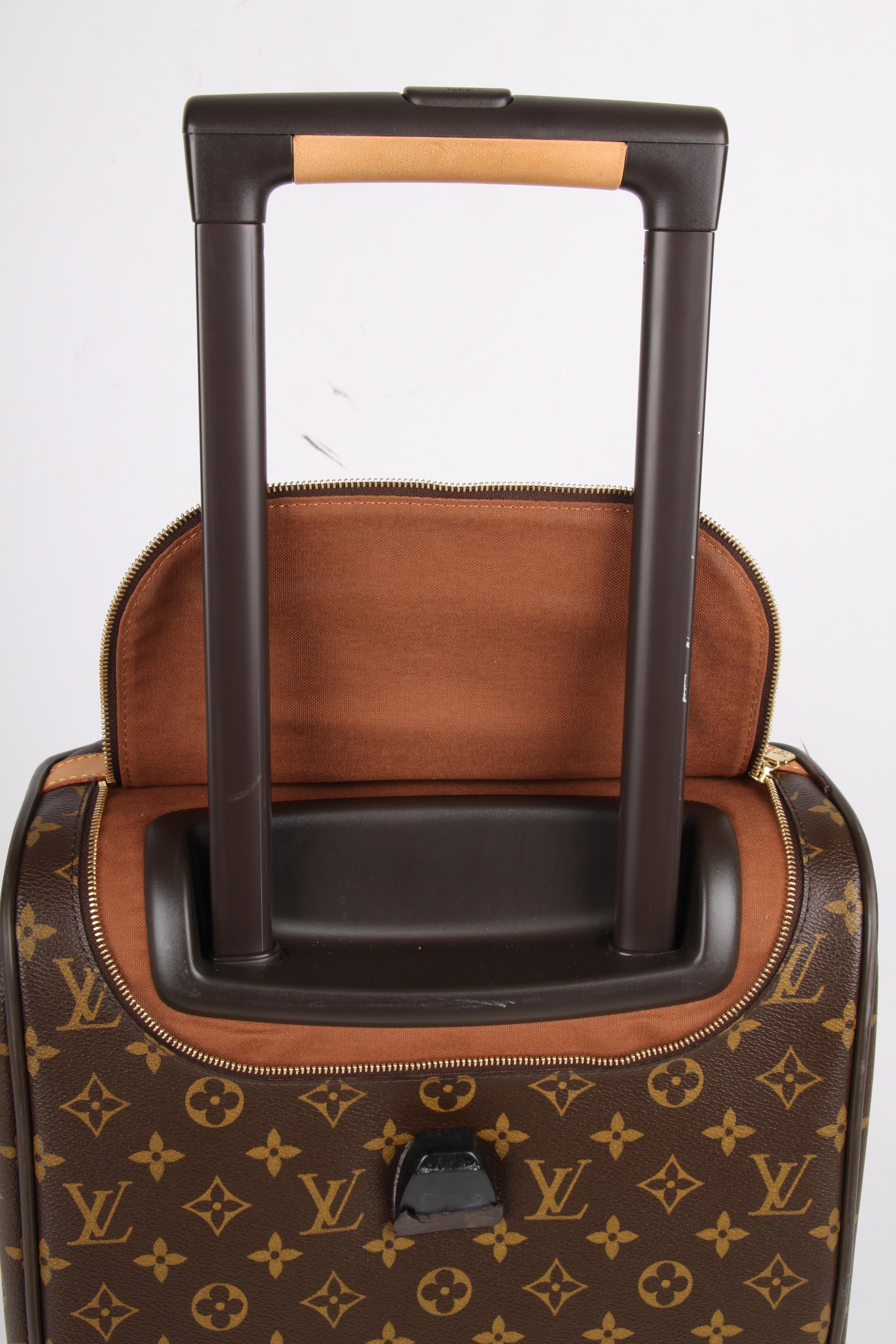 This is the Louis Vuitton Monogram Canvas Eole 50 Rolling Duffle Bag.

Named after a Greek god; the God of the Winds. So, where ever the wind takes you, this bag travels with you. A compact size, very suitable as a weekend getaway bag.

Of course