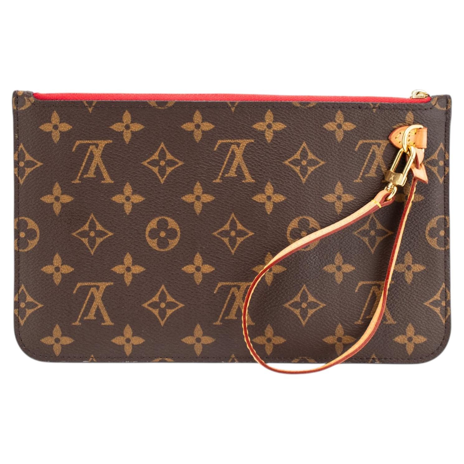 How do I attach a strap to a Louis Vuitton clutch?