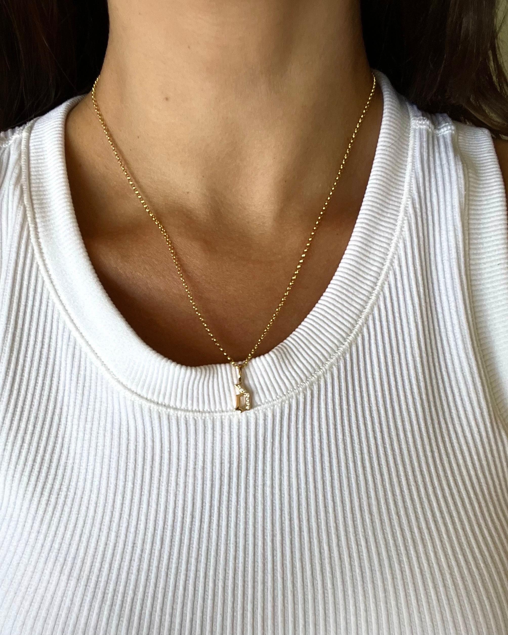 LIMITED TIME SUMMER SALE

Timeless and exceptionally durable, this 18-inch rolo chain is crafted in solid 14k gold and finished with our signature hand-pavé double-sided diamond clasp and gothic style diamond initial pendant. Chain and one letter of