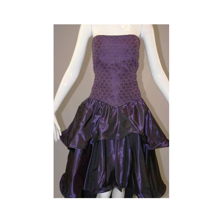 DESIGNER: 1980's Odicini Couture

Please contact for more information and/or photos.

CONDITION: GREAT- THERE ARE 2 TINY PIN HOLES RIGHT BY THE HEM, VERY MINOR AND WON'T BE NOTICED. PLEASE SEE LAST PHOTO. THE COLOR IS MORE LIKE THE LAST PHOTO- A