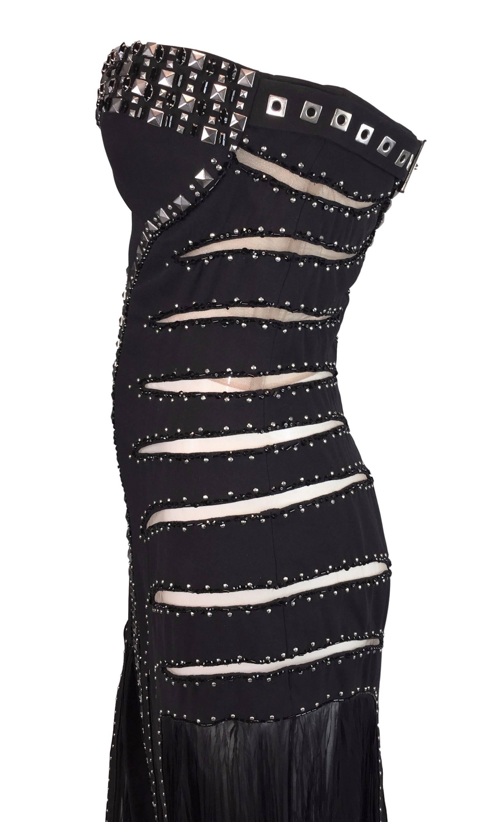 DESIGNER: F/W 2004 Atelier Versace

Please contact for more information and/or photos.

CONDITION: Excellent

MATERIAL: 99% silk 1% nylon

COUNTRY MADE: Italy

SIZE: 40- runs small

MEASUREMENTS; provided as a courtesy only- not a guarantee of fit: