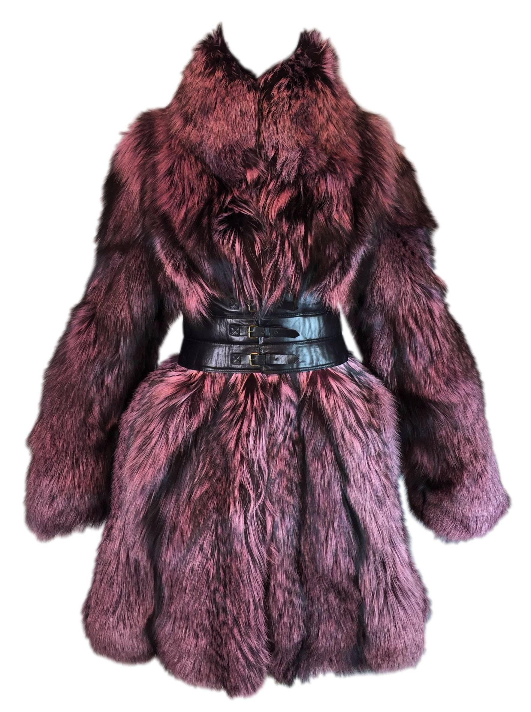 DESIGNER: A/W 2006 Alexander McQueen

Please contact for more information and/or photos.

CONDITION: Excellent- outside is pristine- there is pulling to a seam of the lining on the back and left shoulder- likely from hanging as this coat is heavy.