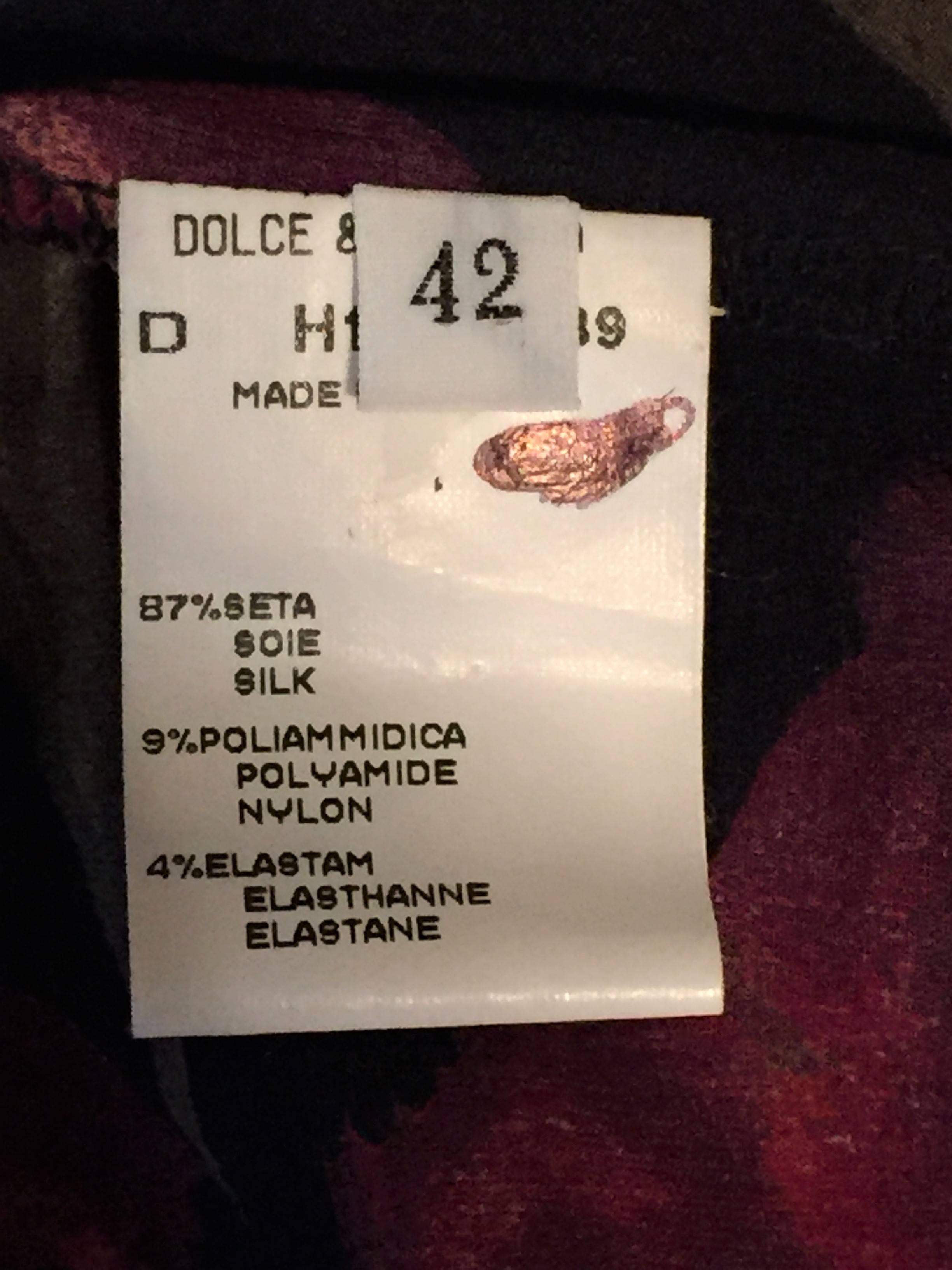 DESIGNER: Circa 1996 Dolce & Gabbana

Please contact for more information and/or photos.

CONDITION: Excellent 

MATERIAL: Silk- Nylon- Elastane

COUNTRY MADE: Italy

SIZE: 42

MEASUREMENTS; provided as a courtesy only- not a guarantee of fit: