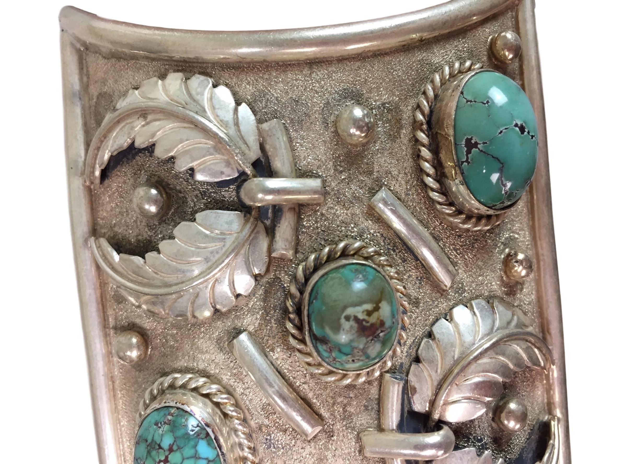 DESIGNER: Vintage Circa 1970's- no designer or artist stamp

Please contact for more information and/or photos.

CONDITION: Good- basic wear- no major flaws or missing pieces

MATERIAL: Sterling Silver & Turquoise

COUNTRY MADE: US

SIZE: Very large