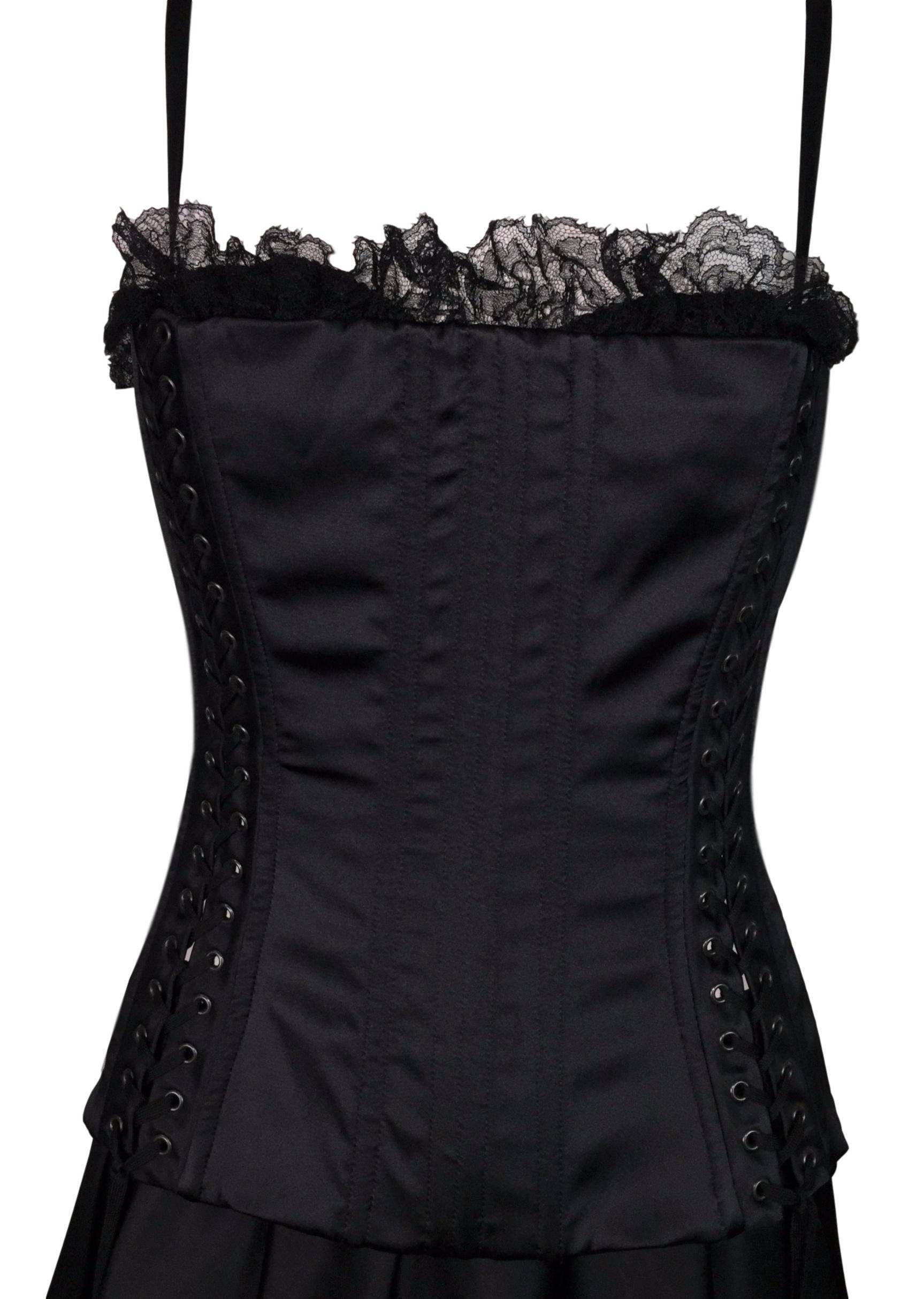 DESIGNER: F/W 2003 Dolce & Gabbana- has an attached bra with a B cup but the bra can be detached and the dress worn as a strapless corset dress and it will accommodate larger bust sizes. 

Please contact for more information and/or