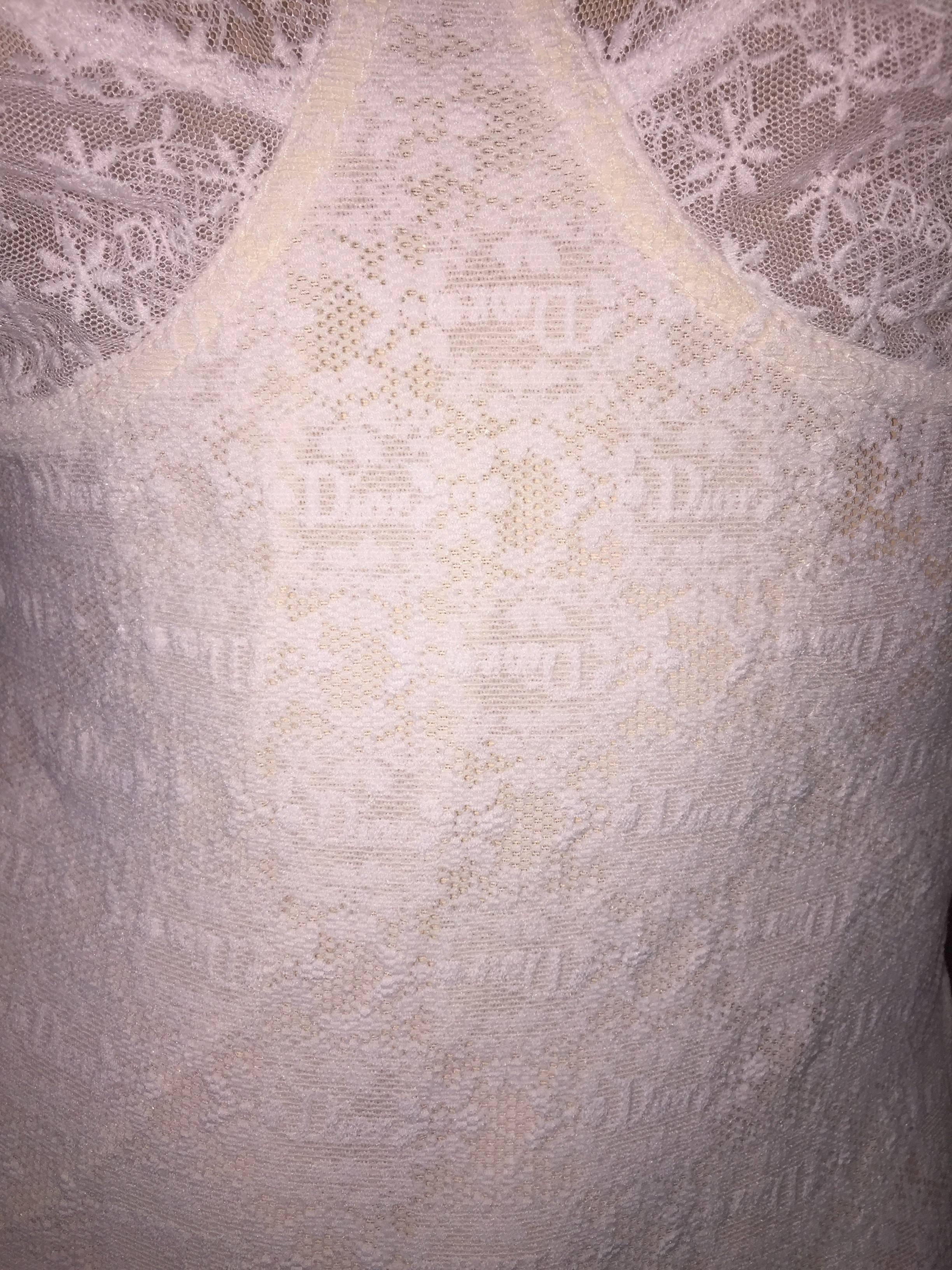 DESIGNER: 1980's Christian Dior 

Please contact for more information and/or photos.

CONDITION: Good- only imperfection is 2 tiny holes in the mesh lining, very minor and will never been seen. 

MATERIAL: Nylon/Cotton/Spandex/Polyester

COUNTRY