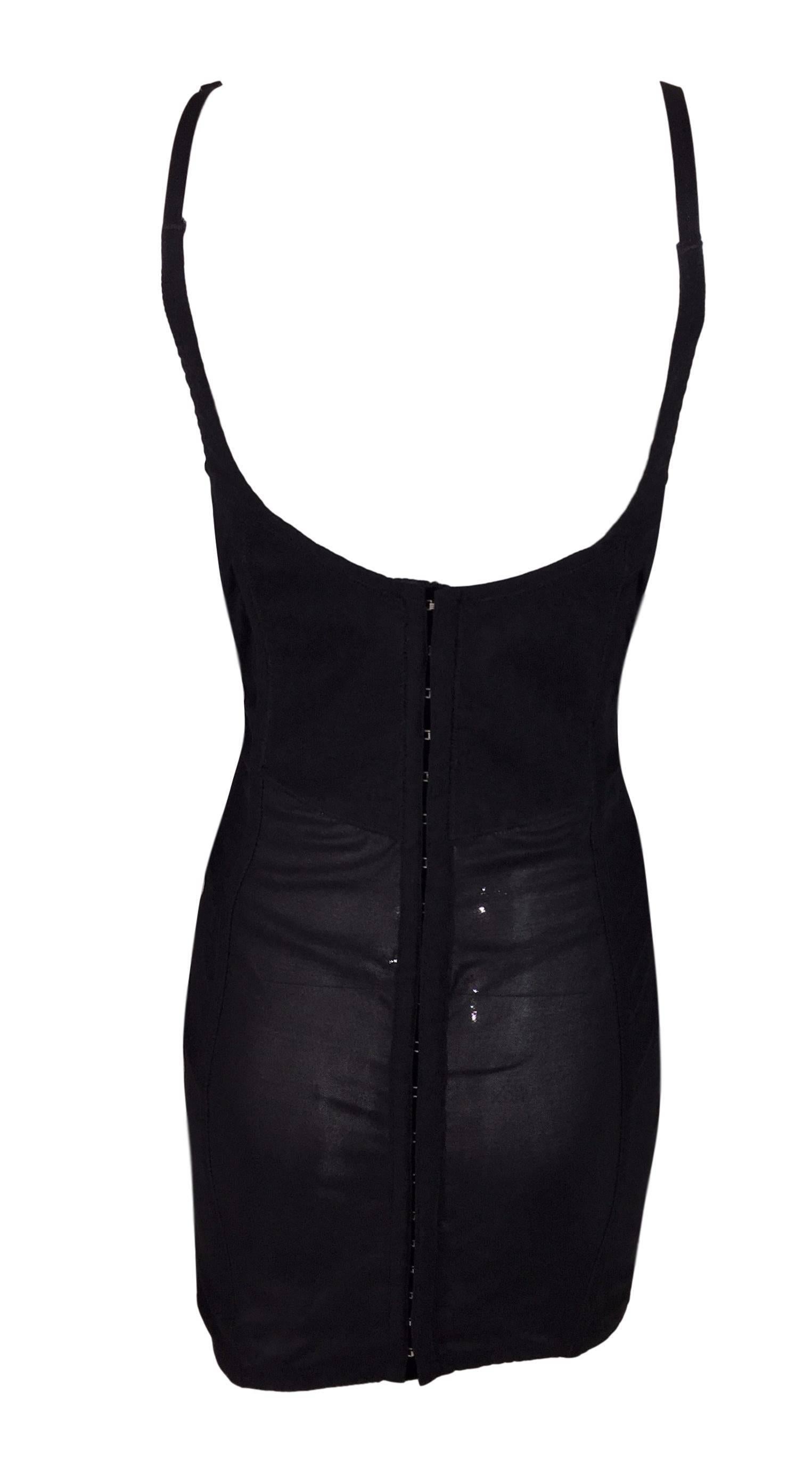 DESIGNER: S/S 1992 Dolce 
Gabbana

Please contact for more information and/or photos.

CONDITION: Good- No holes or stains but elastic in the back has some areas of wear, please see photo. 

MATERIAL: Front is wool, back is an elastic blend.