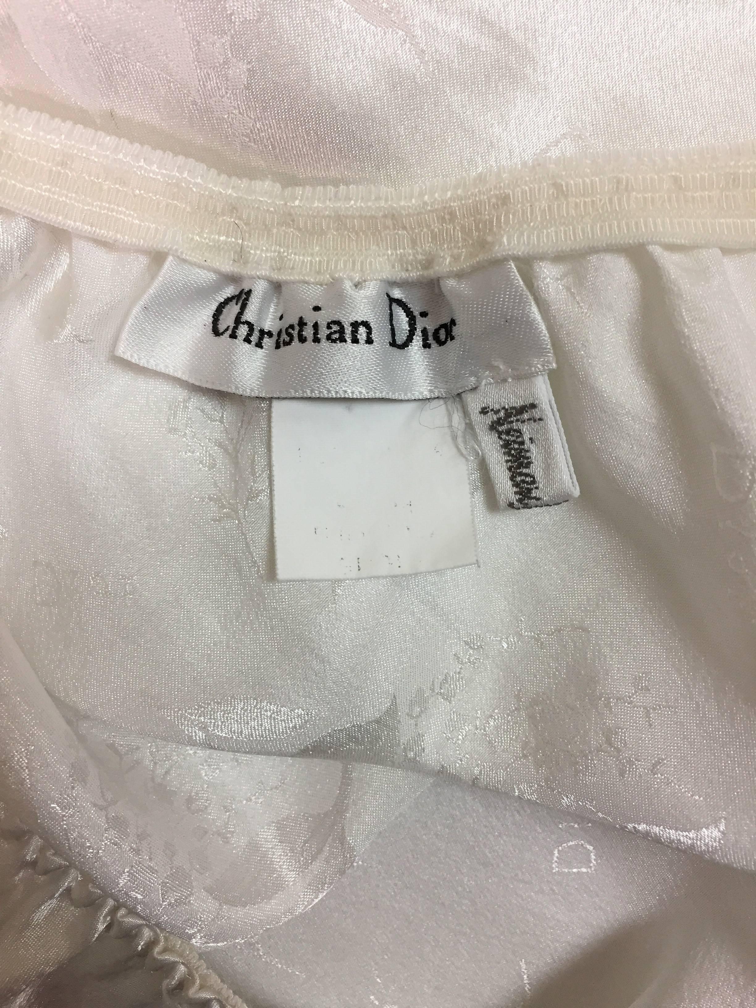 DESIGNER: 1990's Christian Dior

Please contact for more information and/or photos.

CONDITION: Good- no holes or stains, light wear to the end of the lace trim, please see last photo. 

MATERIAL: unknown

COUNTRY MADE: USA

SIZE: Unknown- can fit